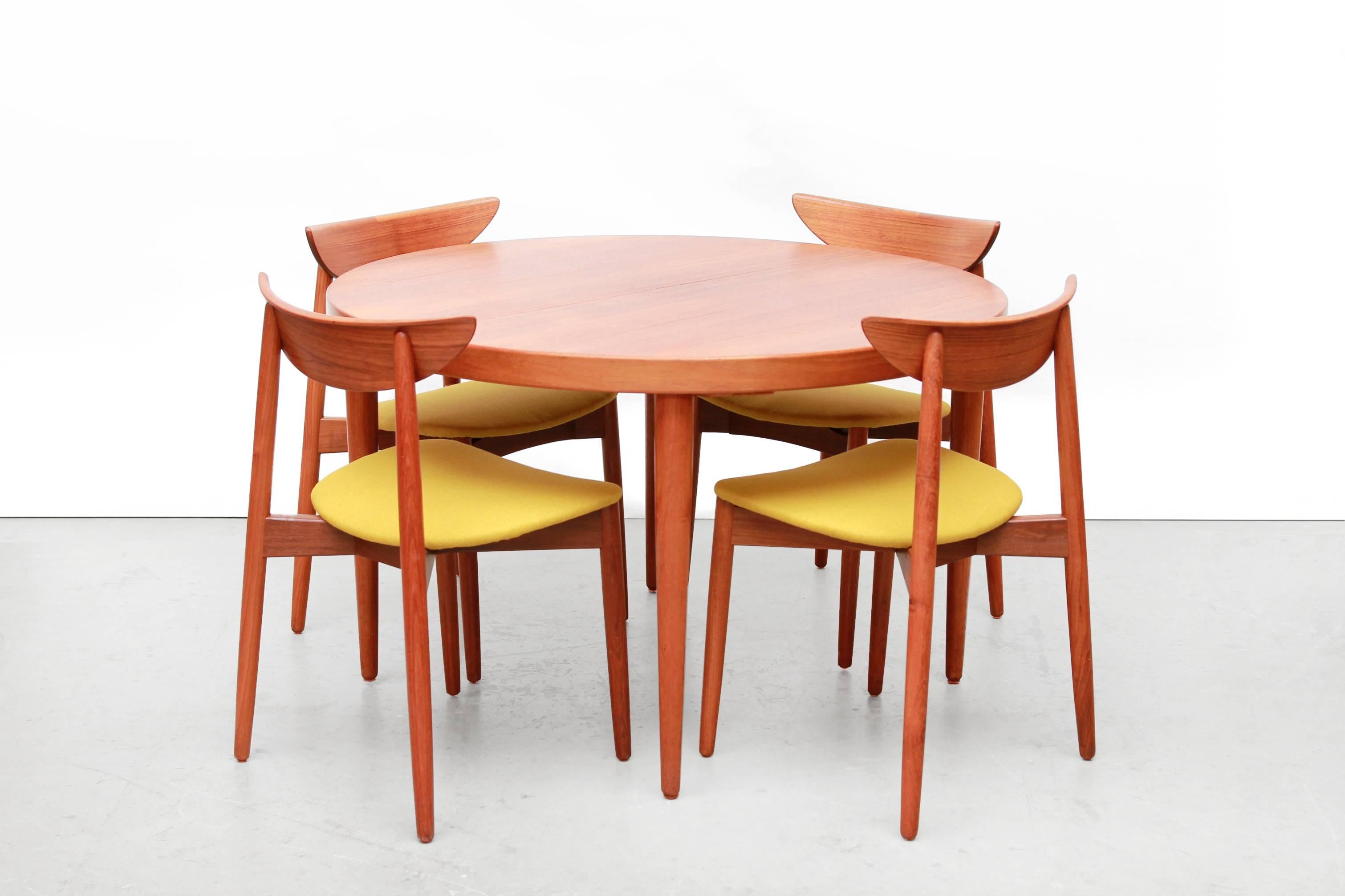 Scandinavian Modern Danish Round / Oval Extendable Dining Room Table by Kai Kristiansen in Teak
