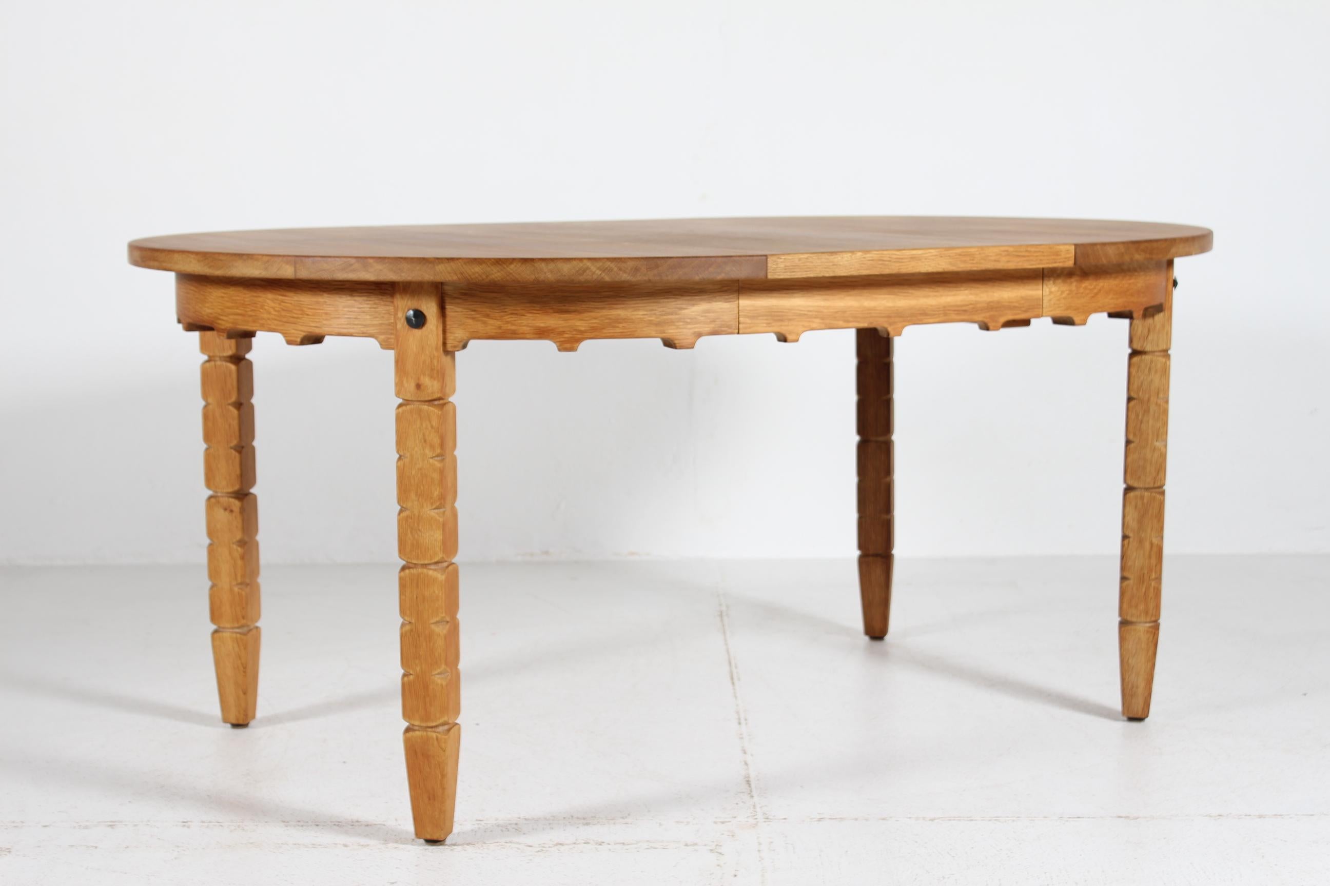 Late 20th Century Danish Round Extendable Dining Table of Oak in Henning  Kjærnulf Style Ø 120 cm For Sale