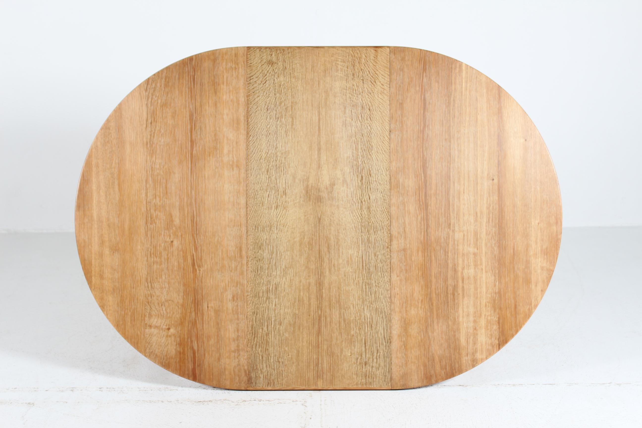 Late 20th Century Danish Round Extendable Dining Table of Oak in Henning  Kjærnulf Style Ø 120 cm For Sale