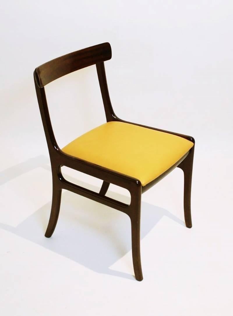 Set of six dining chairs designed by Ole Wanscher for Poul Jeppesen, Denmark, 1950. Tese chairs are from the Rungstedlund series and are made of solid mahogany wood and these examples have a leather upholstery. It is in good condition with a very