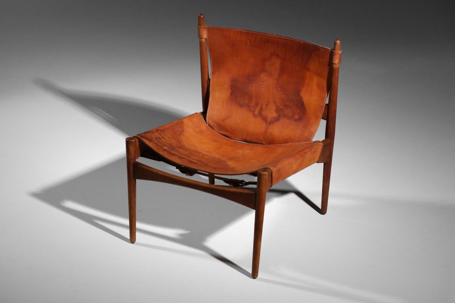 Danish safari armchair in patinated leather and teak from the 60's For Sale 6