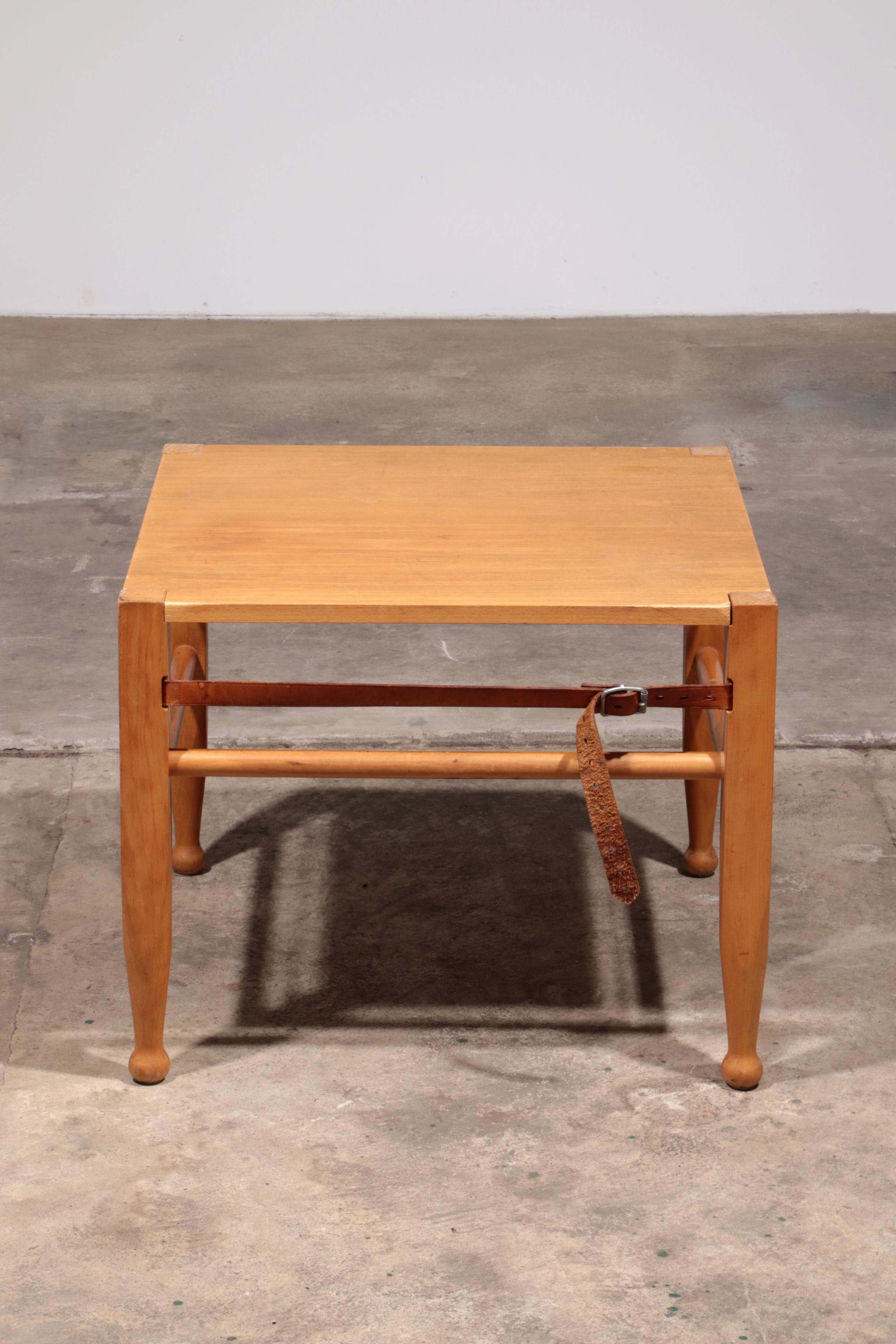 Danish Safari Coffee Table Oak With Leather by Kaare Klint

This is a beautiful coffee table design by Kaare Klint.

Made of oak wood with cowhide leather straps.

The elegant finished legs indicate its design.

Additional information:
Dimensions: