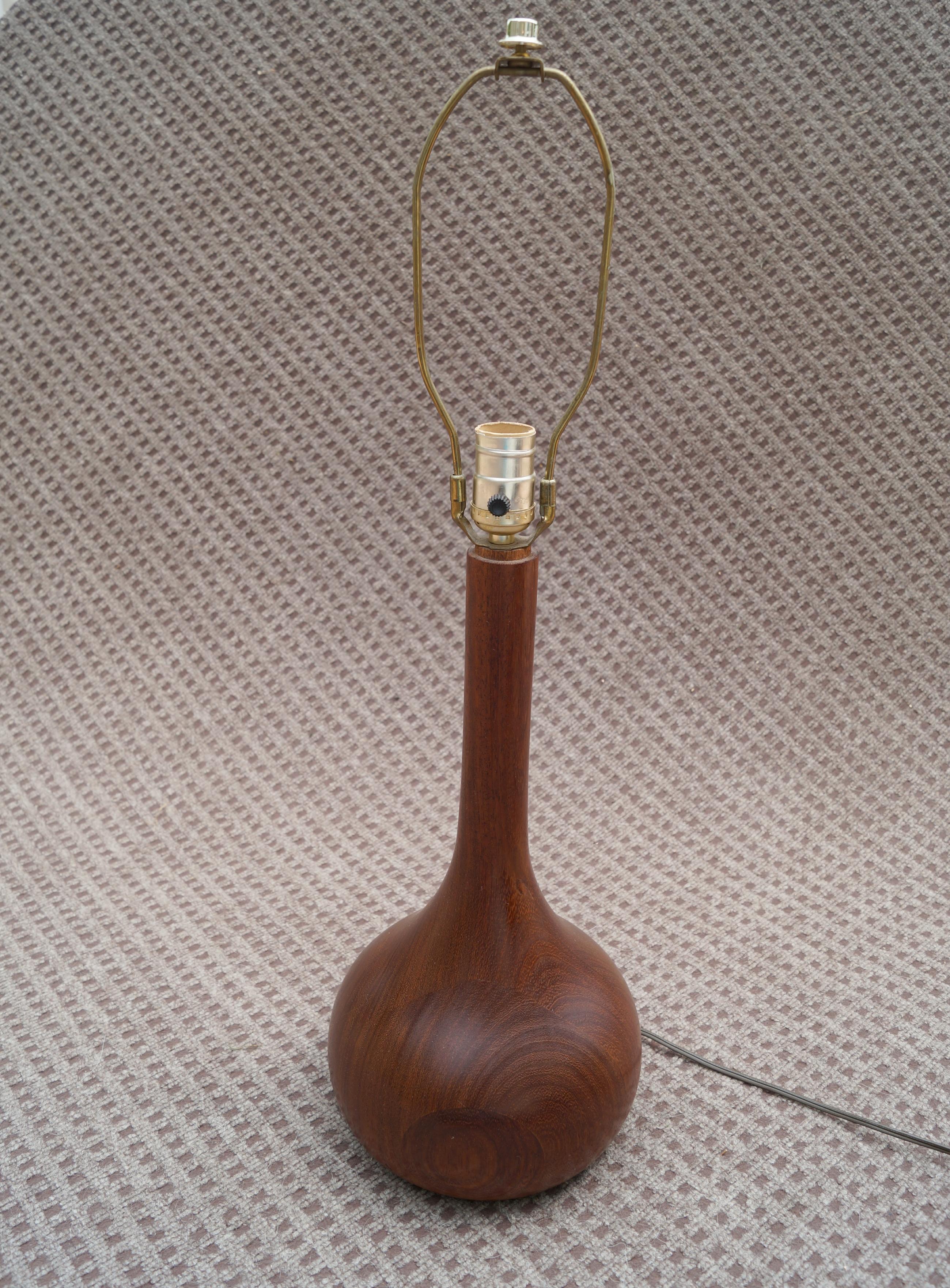 Danish Mid-Century Modern 3 way Teak Table Lamp. The photos are showing white glare marks. It is 18 7/8