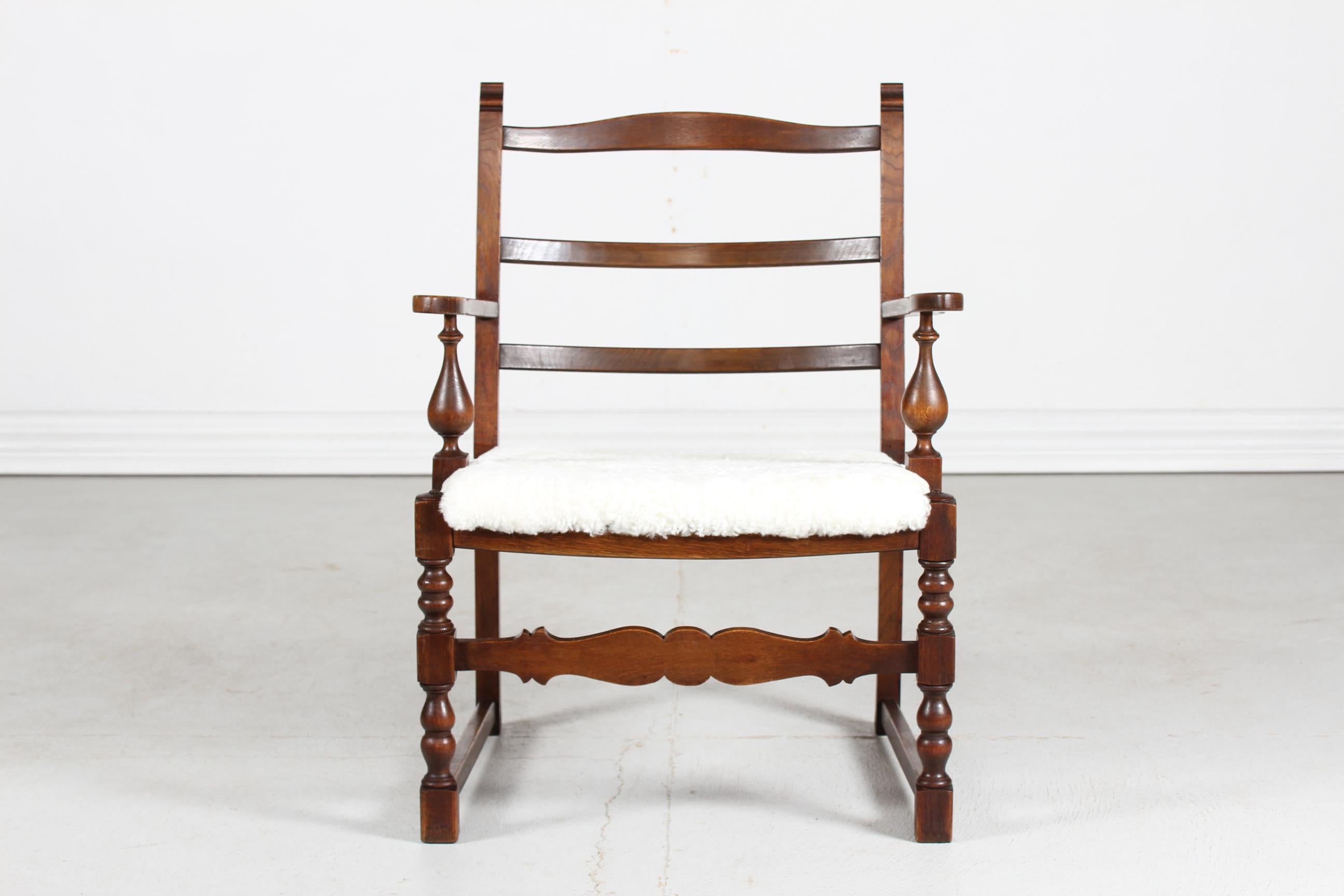 Danish Sculptural Handcrafted Armchair of Solid Oak with New Sheepskin 1940s (Handgeschnitzt) im Angebot