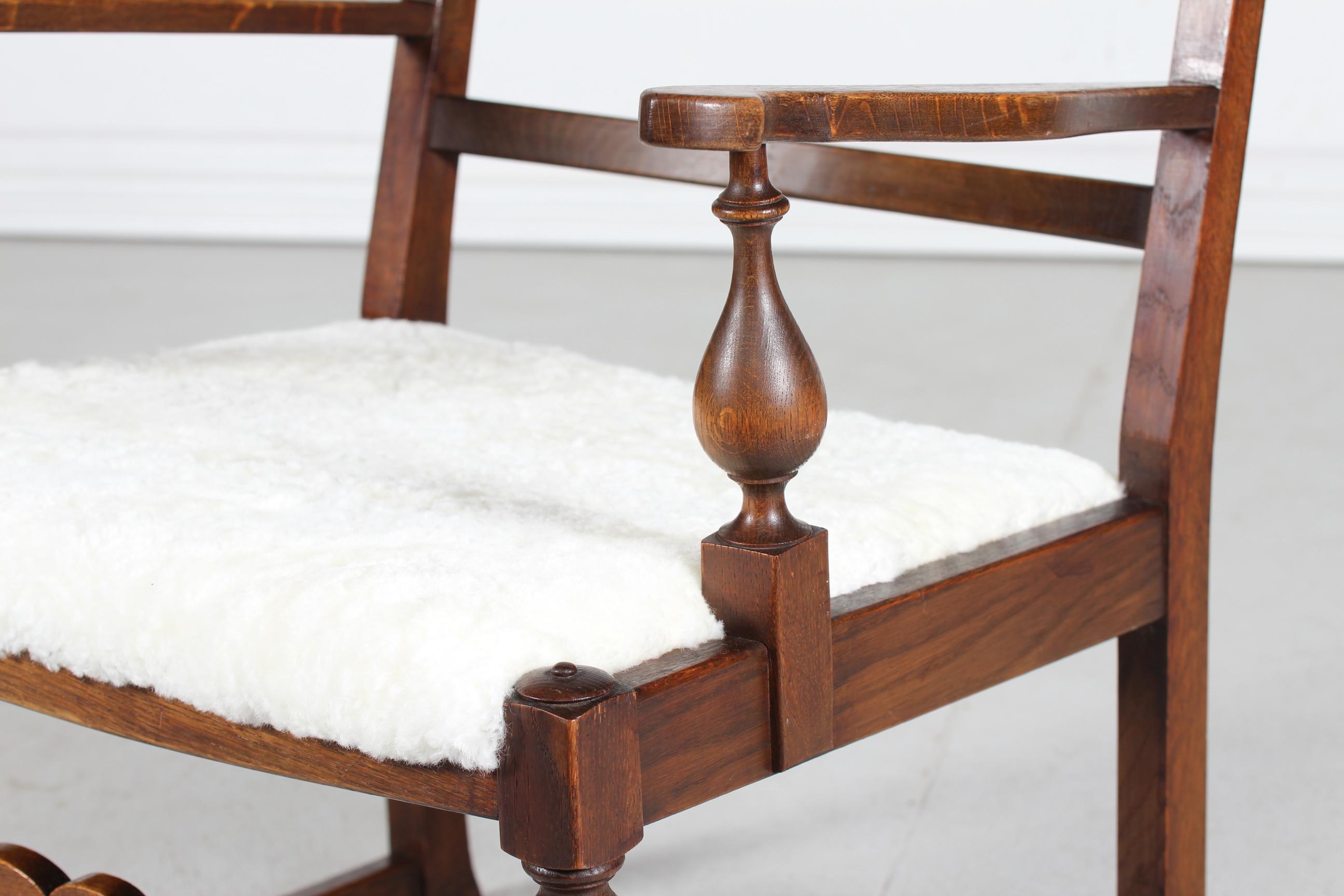Danish Sculptural Handcrafted Armchair of Solid Oak with New Sheepskin 1940s (Schaffell und Schafleder) im Angebot