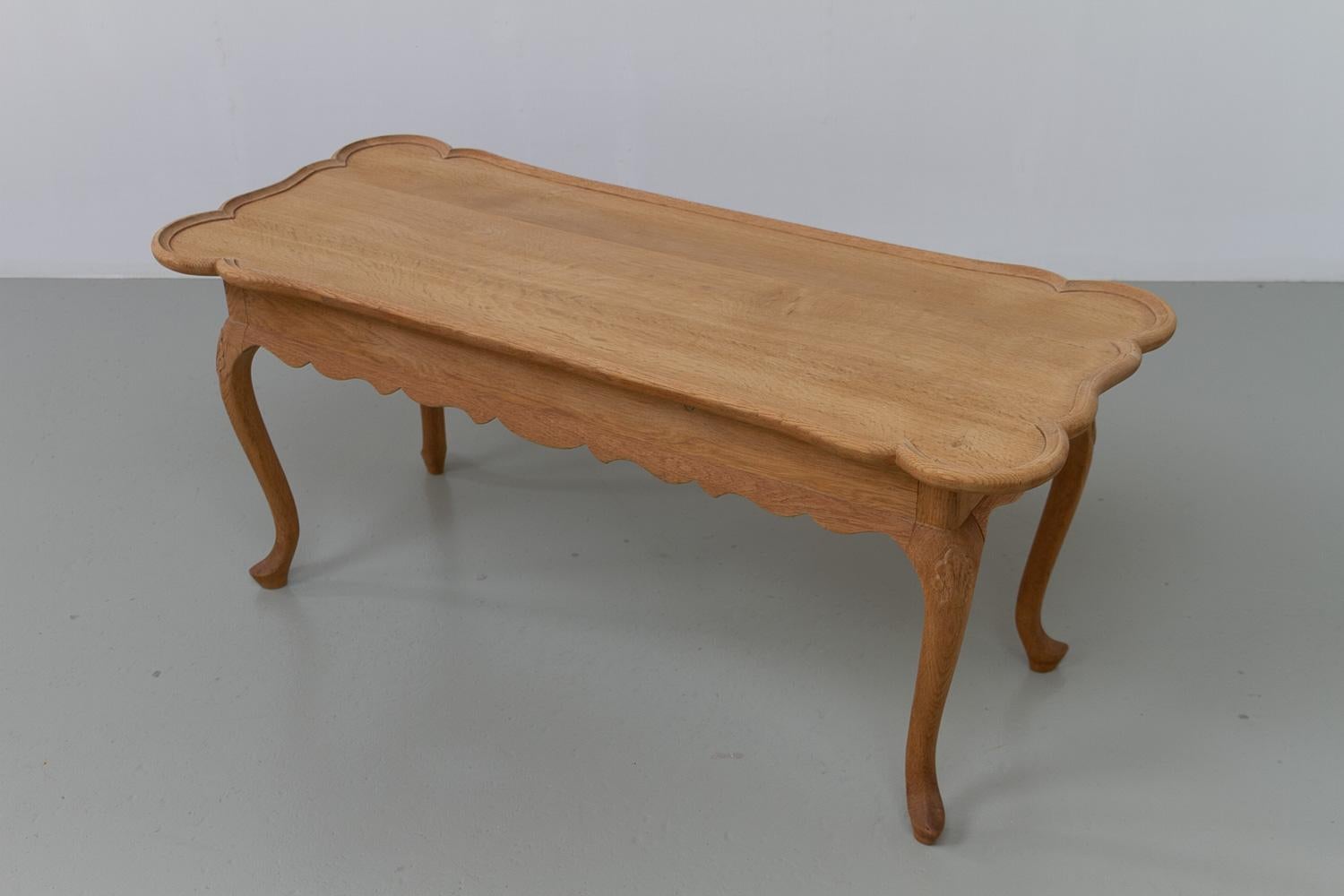 Danish Sculptural Solid Oak Coffee Table by Frits Henningsen, 1940s.

This lovely oak coffee table with cabriole legs was made in Denmark in the period between 1930 and 1950, attributed to Danish master carpenter Frits Henningsen.

Beautiful and