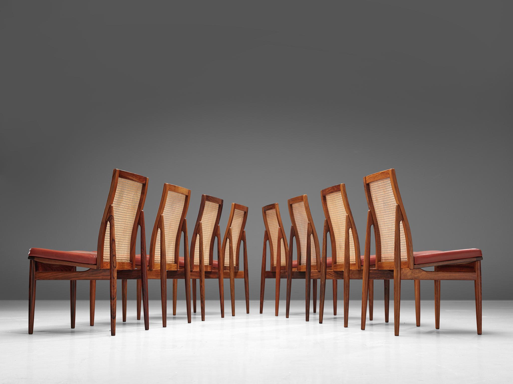 Set of 8 dining chairs, oak, cane and leather, Denmark, 1960s

A beautiful and very comfortable set of eight oak dining chairs, these were made in Denmark. The chairs have been completely restored and reupholstered, which means you'll receive