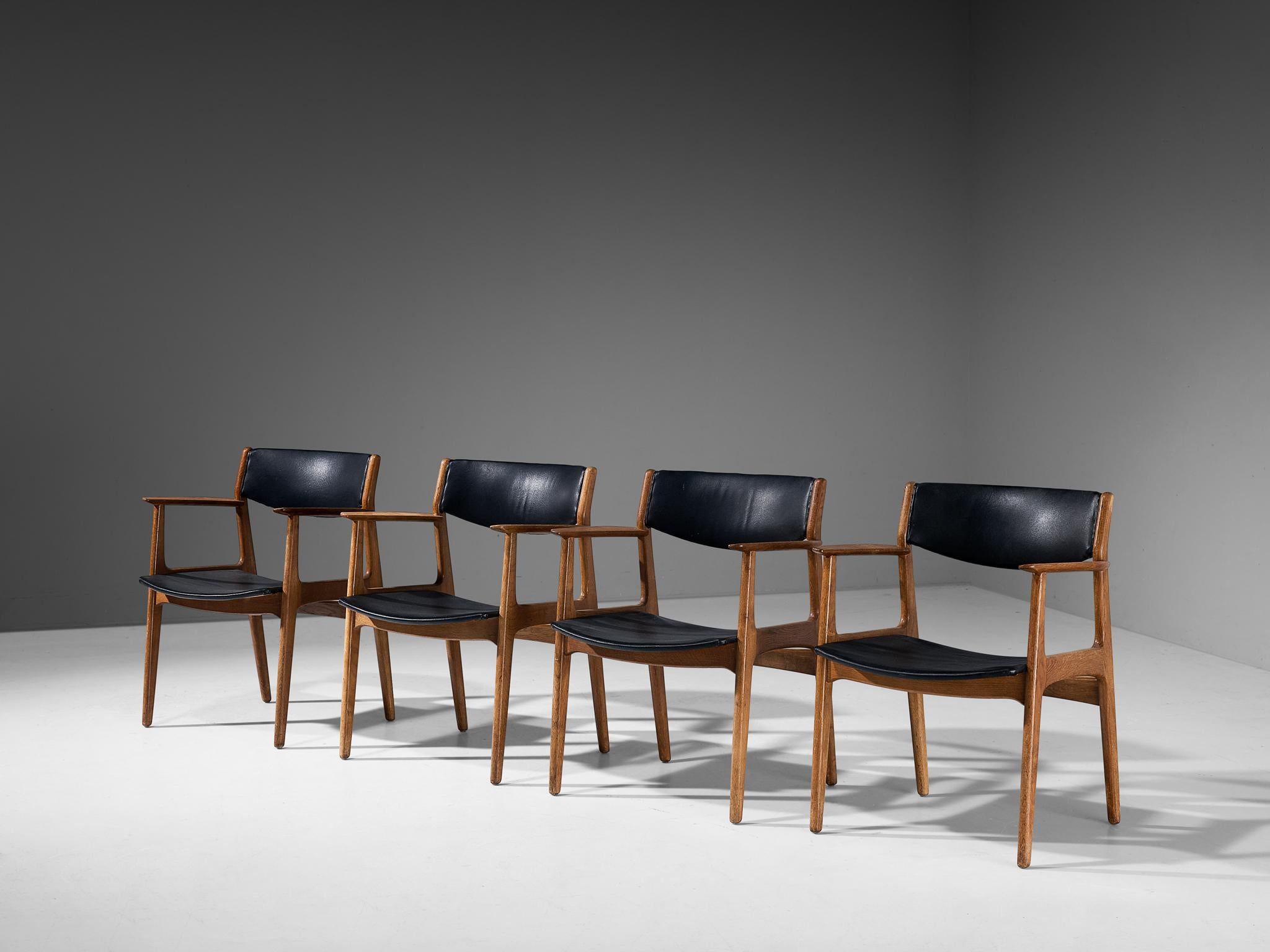 Set of four dining chairs, leatherette, oak, Denmark, 1960s 

This classic set is being a wonderful example of Scandinavian design from the Midcentury period. The seat and backrest are characterized by subtle curved lines and round shapes that