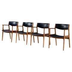 Danish Set of Four Armchairs in Oak and Black Leatherette