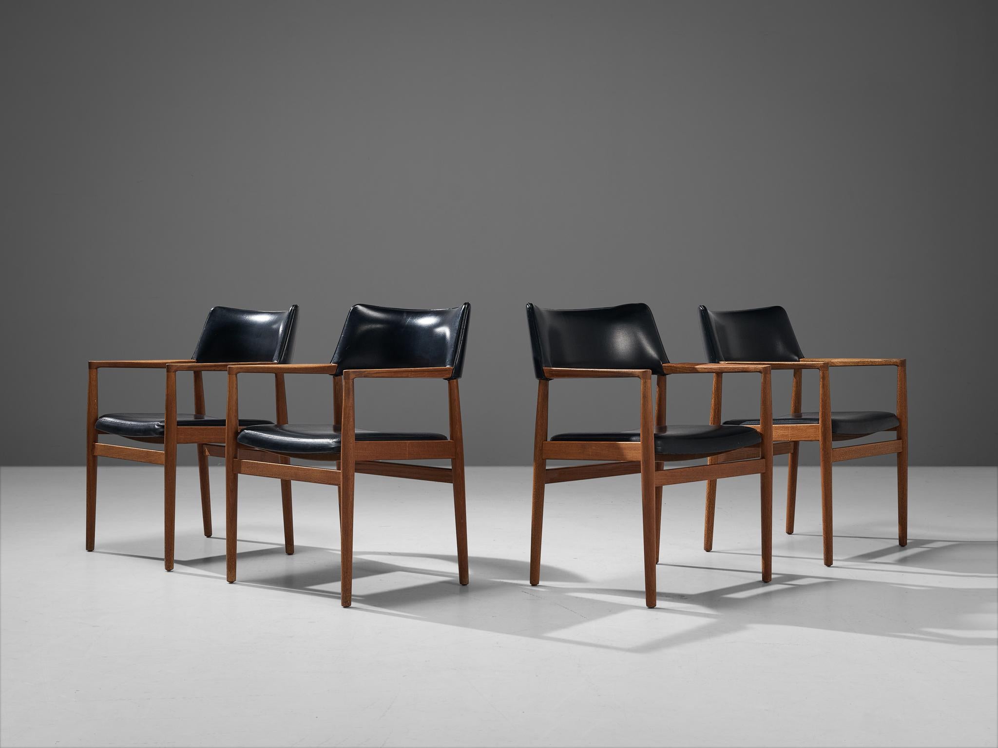 Set of four dining chairs, leatherette, teak, Denmark, 1960s.

This set of four armchairs shows strong resemblances to the Tove and Edvard Kindt-Larsen’ chair for Gustav Bertelsen & Co designed in 1958. This classic set is being a wonderful example