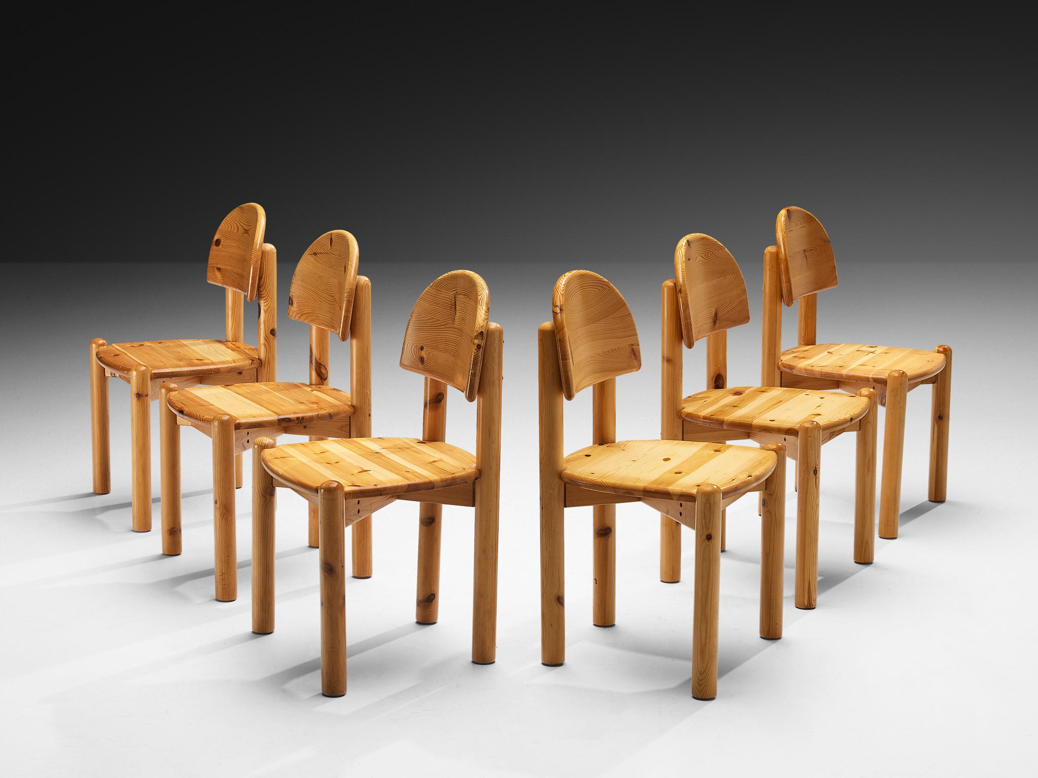 Set of six dining chairs, pine, Denmark 1970s. 

Beautiful, organic and natural dining chairs in solid pine. A simplistic design with a round seating and attention for the natural expression and grain of the wood. These chairs hold a beautiful