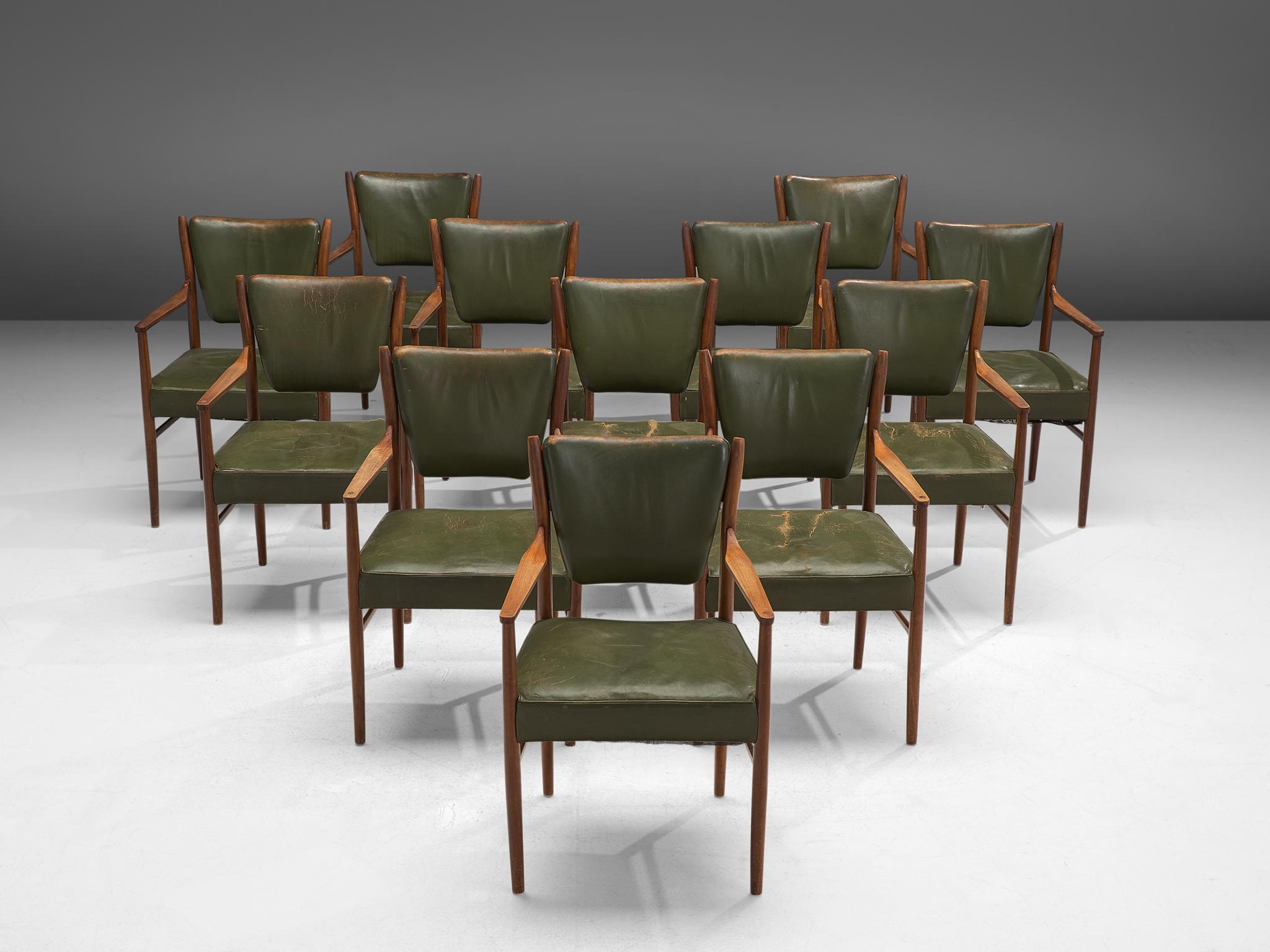 Set of 12 armchairs, in walnut and leather, Denmark, 1950s.

This set of elegant easy chair in olive green leather and walnut show signature characteristics of Danish modern design. The frame is modest and very well executed with wonderful