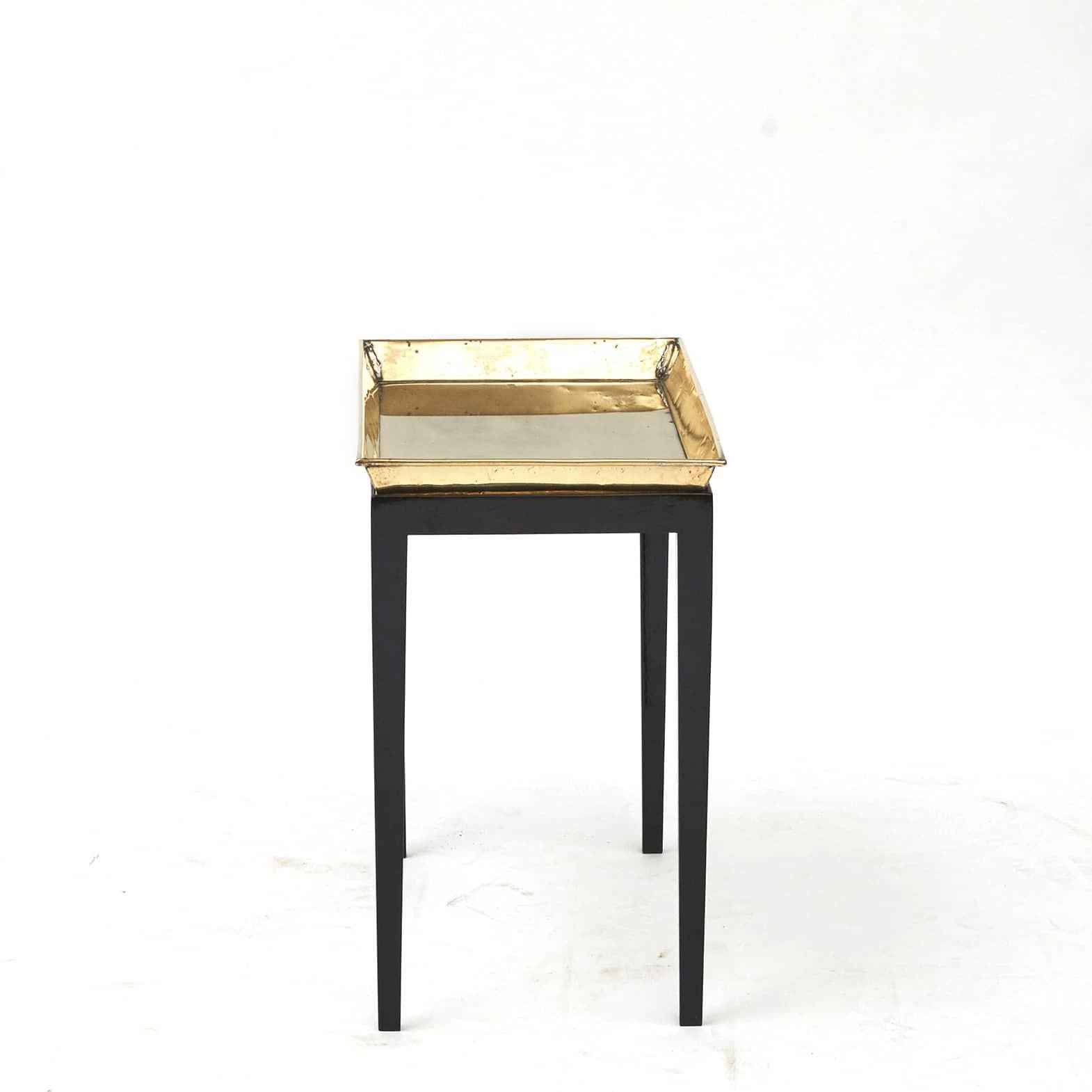 Side table with brass tray (loose) on black lacquered wooden stand.
Denmark approx. 1950.