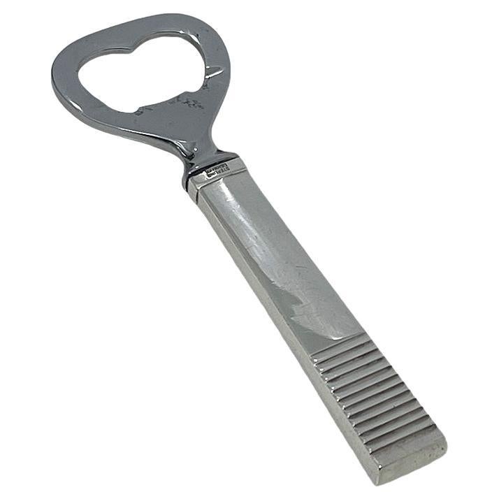 Abrebotellas danés de plata de Georg Jensen, hacia 1950
