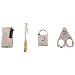 Danish Silver, Lighter, Cigarette Holder and Two Cigar Clippers, 1930s-1940s