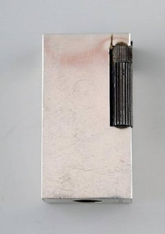 Danish Silver, Lighter, Cigarette Holder and Two Cigar Clippers, 1930s-1940s