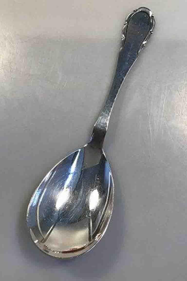 Danish silver serving spoon 

Measures 21.5 cm( 8½ in).
 