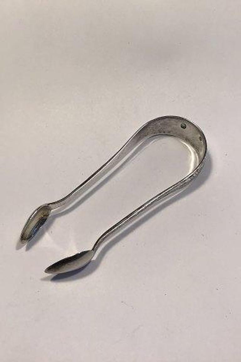 Danish silver sugar tongs 830

Measures 10.5 cm/4.13