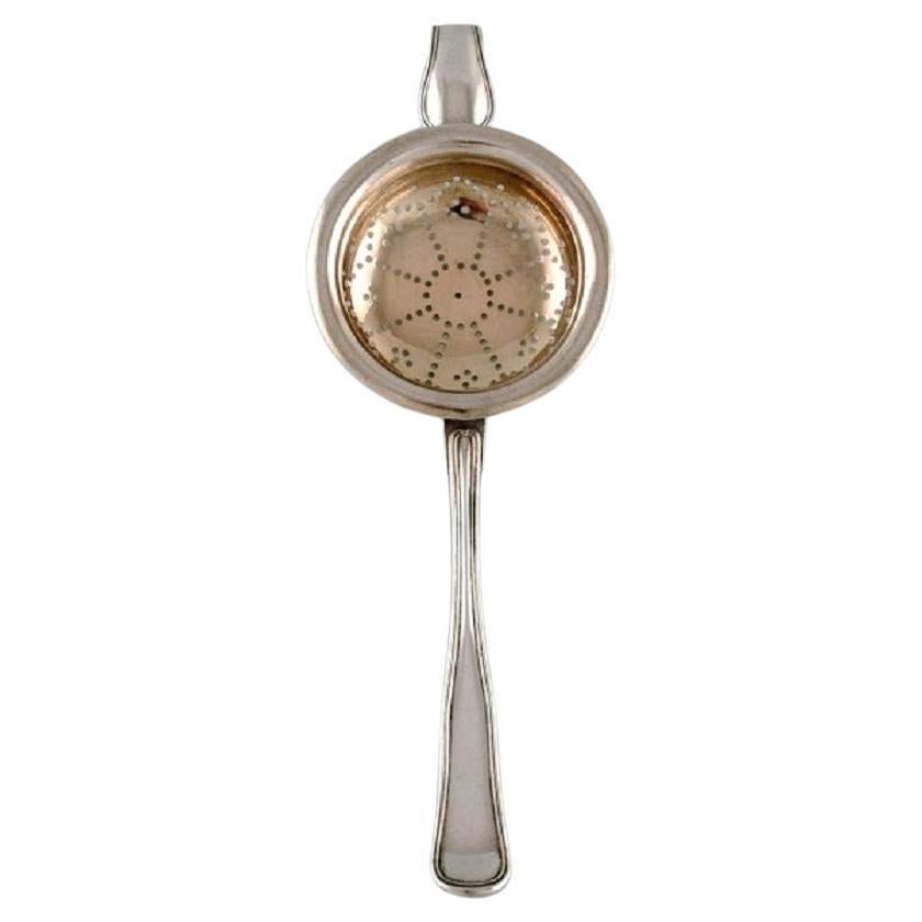 Danish silversmith. Antique silver tea strainer. Dated 1873 For Sale