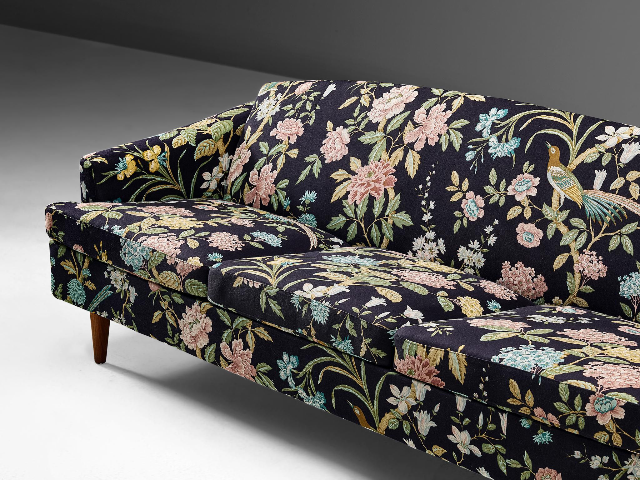 sofa with floral upholstery