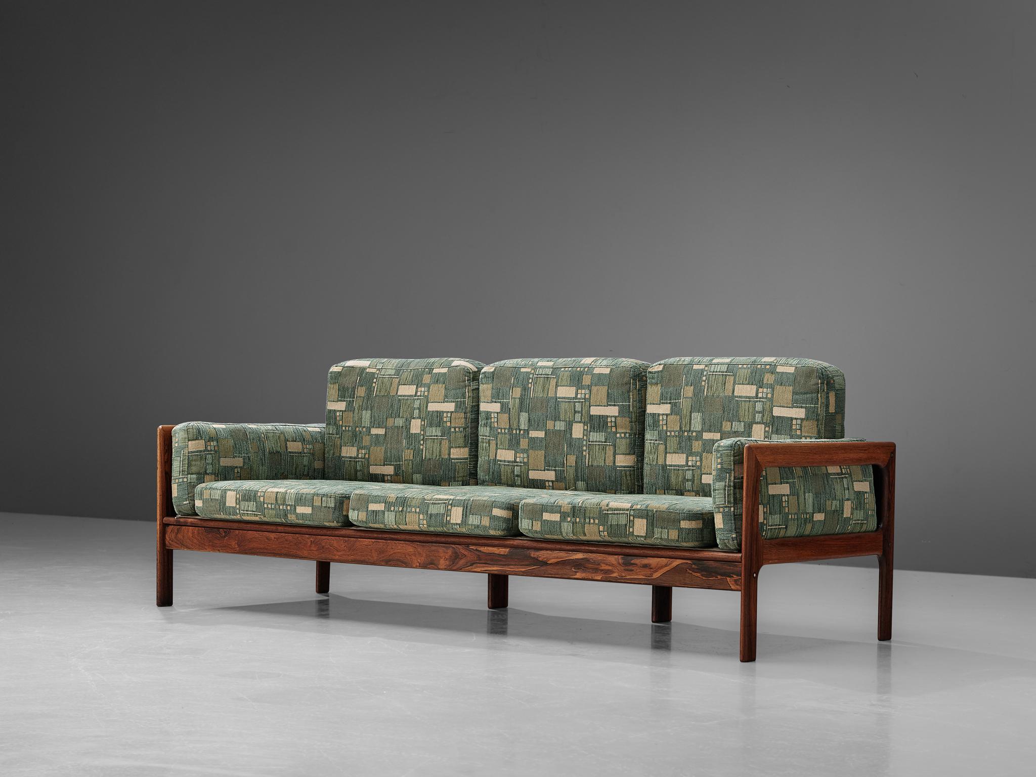 green patterned sofa