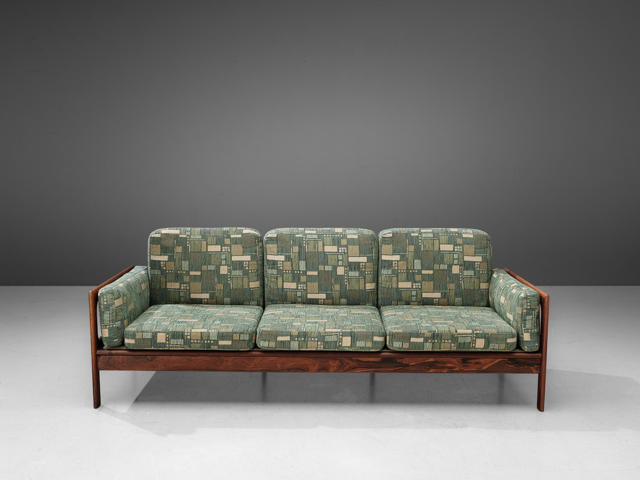 green patterned couch