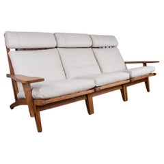 Danish sofa in solid oak and fabric, model GE375 by Hans Wegner for Getama 1960.