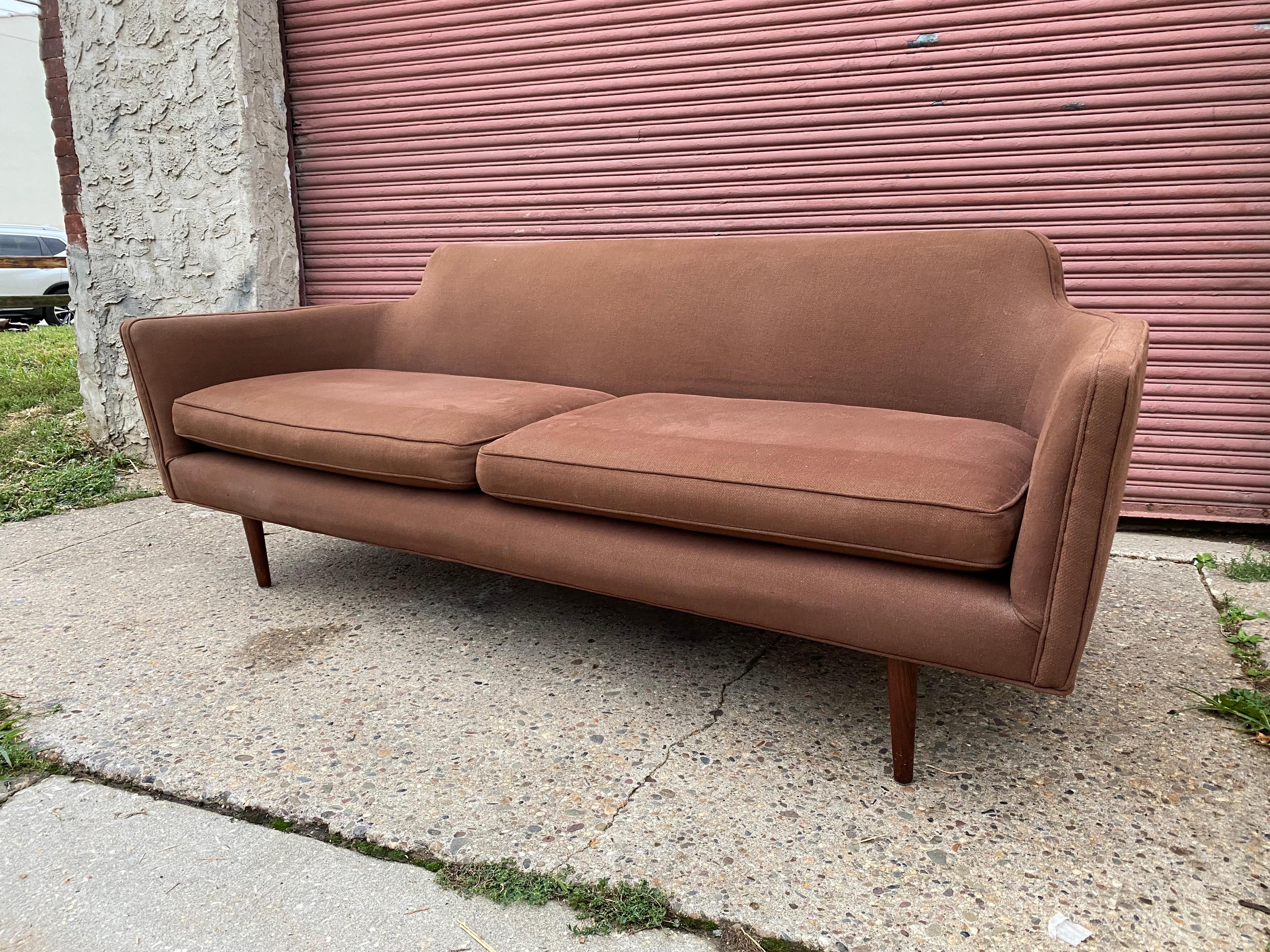 Sleek stylish probably Danish sofa, although have found attributed to Adrian Pearsall?! Have never seen any of his work with Rosewood legs. Amazing scale and size! Sofa measures just 81