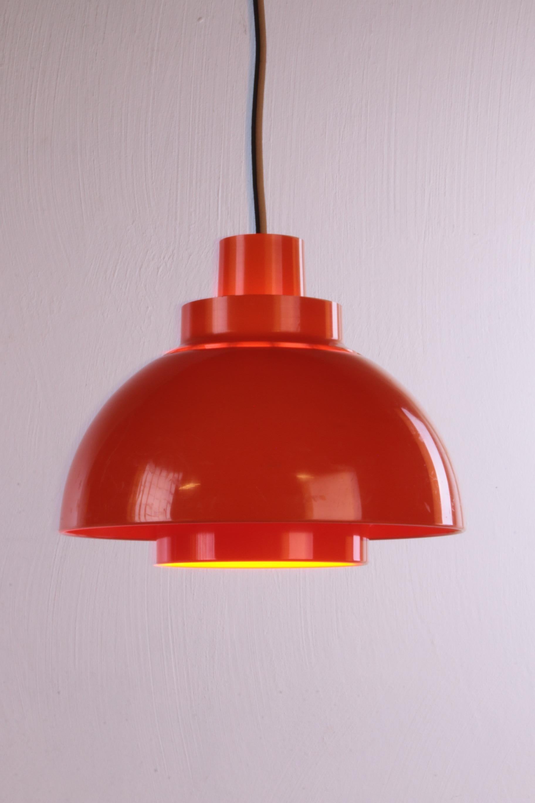 This beautiful Space Age Solar Minisol pendant lamp in a striking bright orange color will be a real eye-catcher at home.

Designed by K. Kewo for Nordisk Solar in the 1970s. The lamp is of very good quality for its age, as can be seen in the