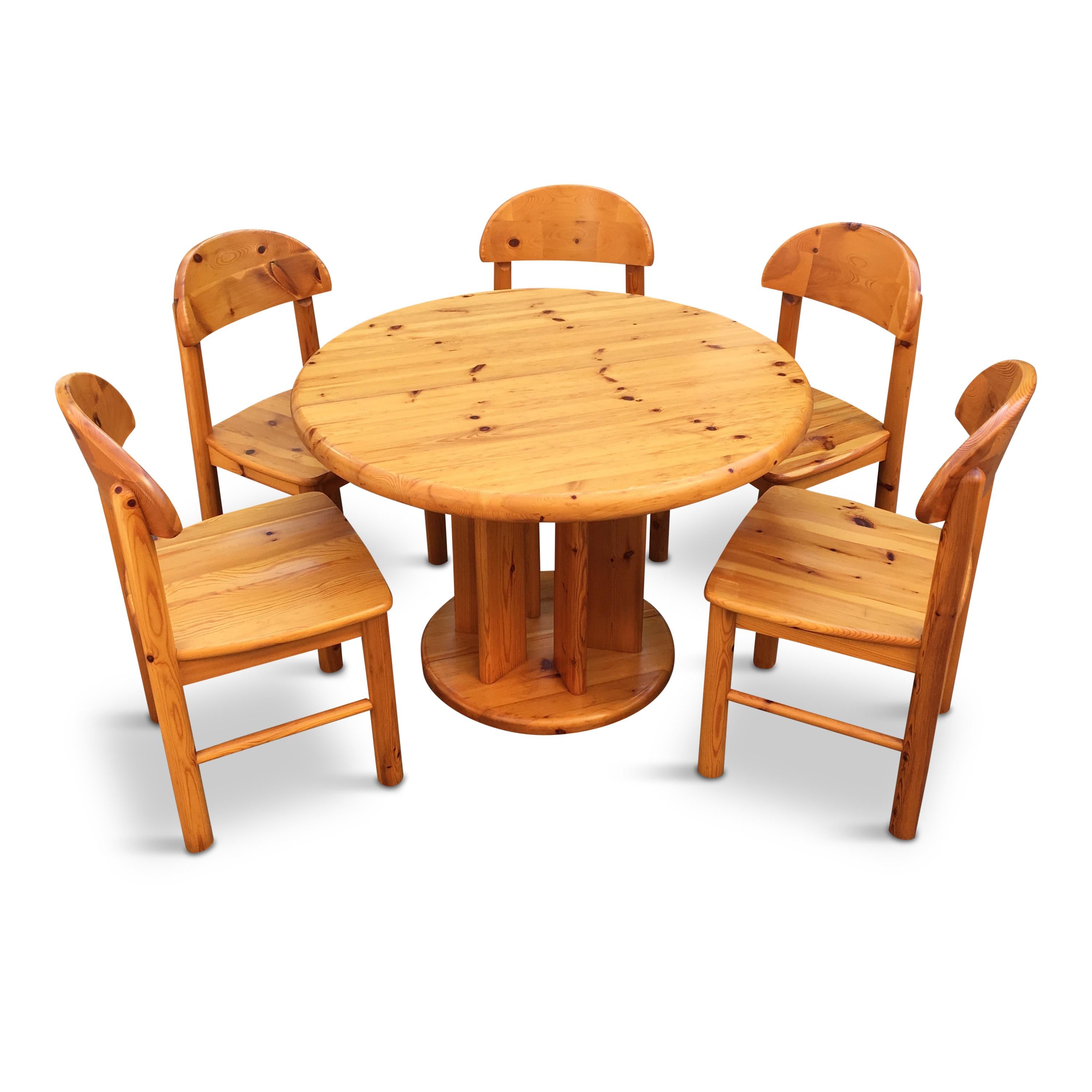 Extendable pedestal dining table with 5 dining chairs, the desk and the base are joined by 6 minimalistic columns. This set looks very sculptural. Great choice for a chalet or city residence.

Table:
H 73 cm
closed - D 107 cm
extended - D 107