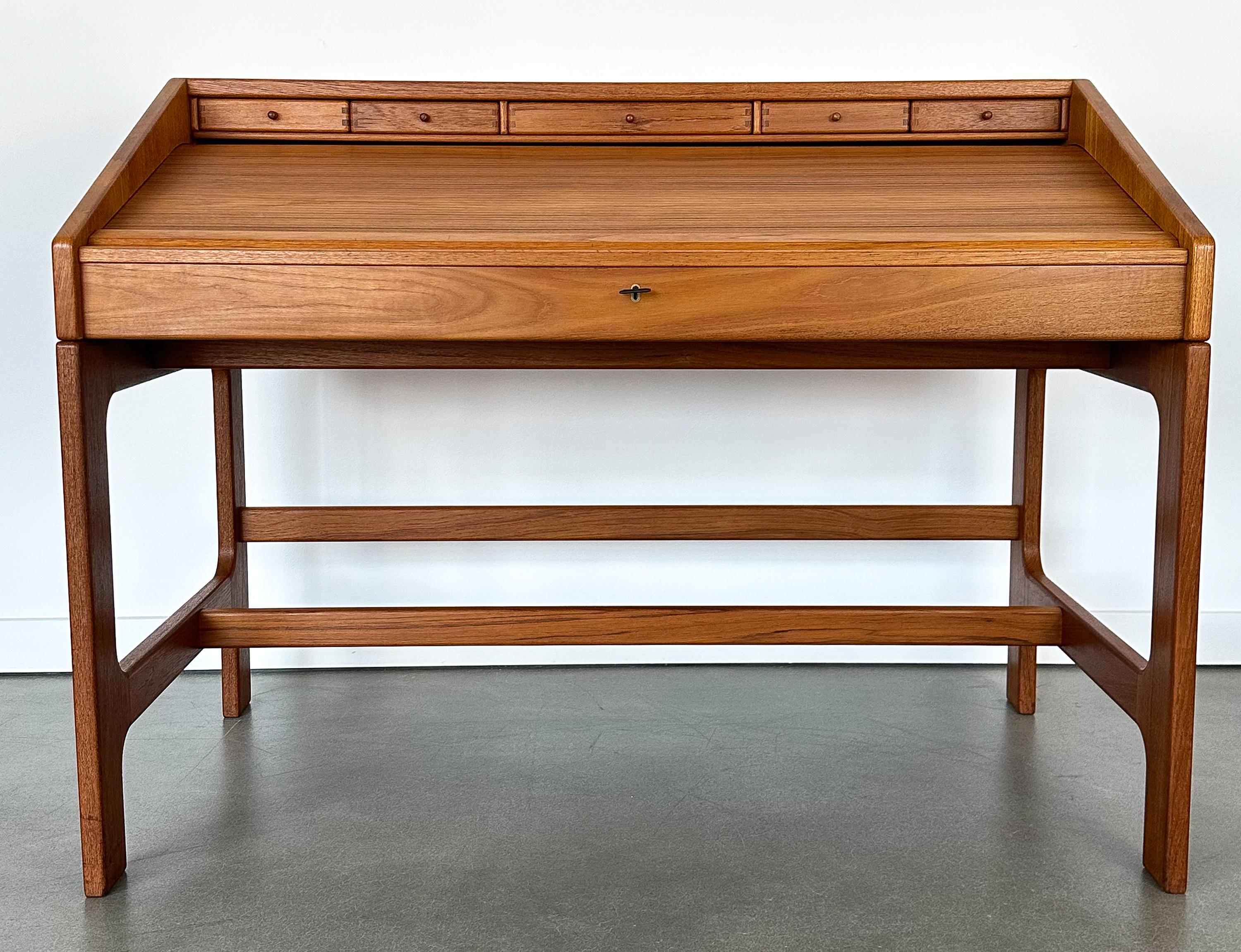 Danish Modern solid teak roll top desk by John Mortensen for Langeskov Mobelfabrik.  Designed in 1987.  Model: 