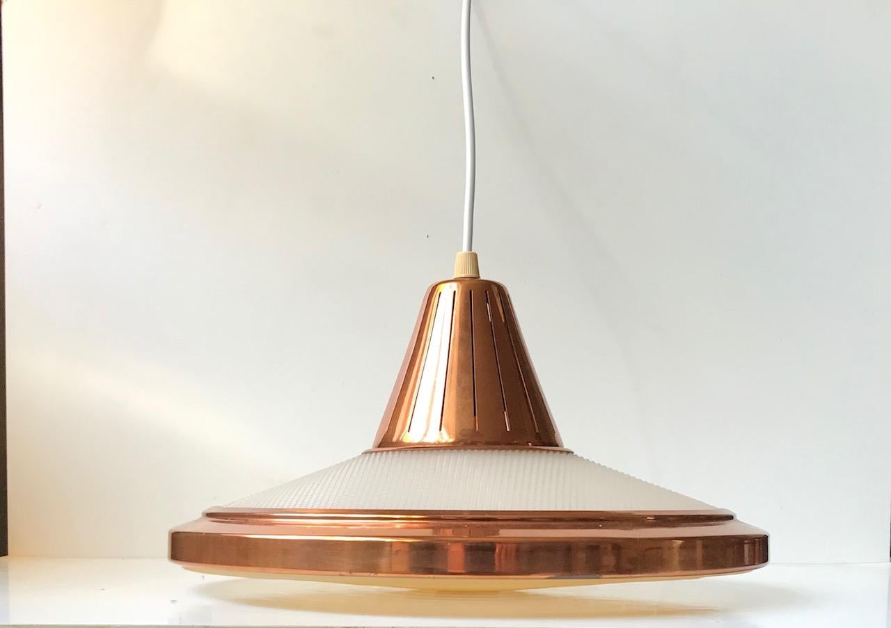 - Danish lamp from the 1960s made out of solid copper and white textured acrylic
- Gives a fantastic down and upward glow
- On the bottom there is a diffuser that softens the light
- It was designed by Vitrika in Denmark and manufactured during