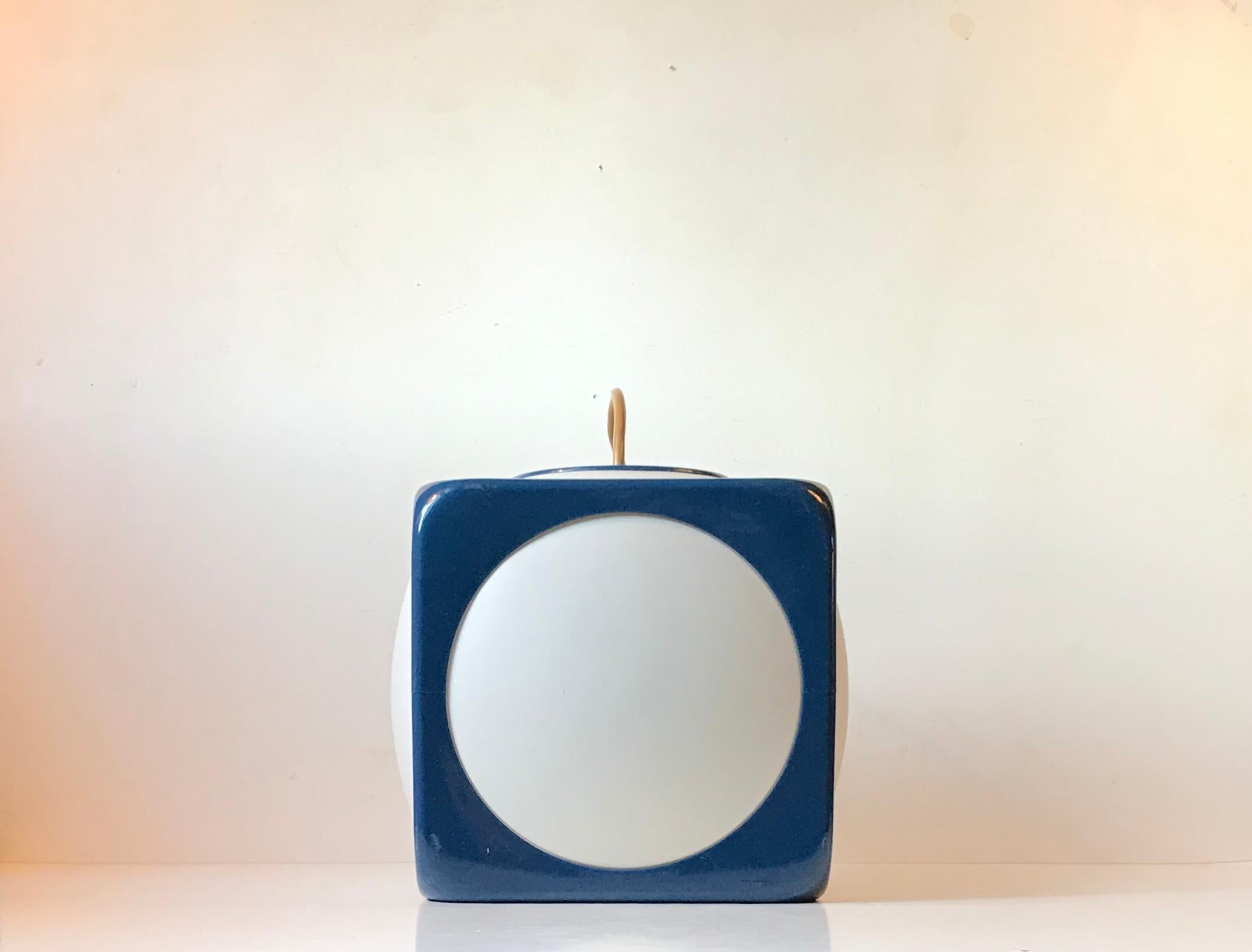 This light from danish Hoyrup Lamper was designed and manufactured during the 1970s. It is for obvious reasons called 'Dice' and is made from petrol blue acrylic and thin white lucite panels.