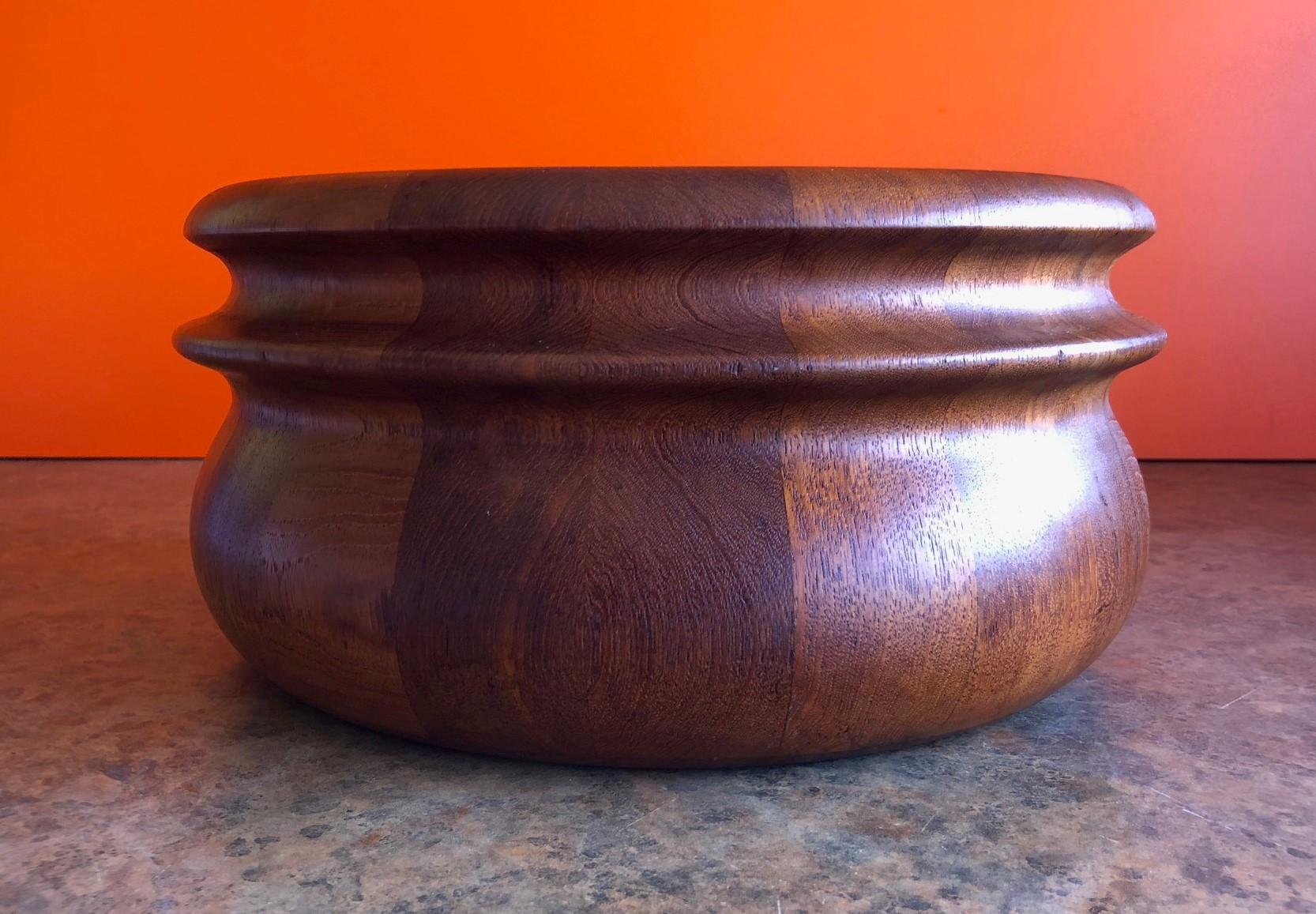 Well crafted Danish staved teak bowl, circa 1960s. The bowl is in excellent condition and is 10