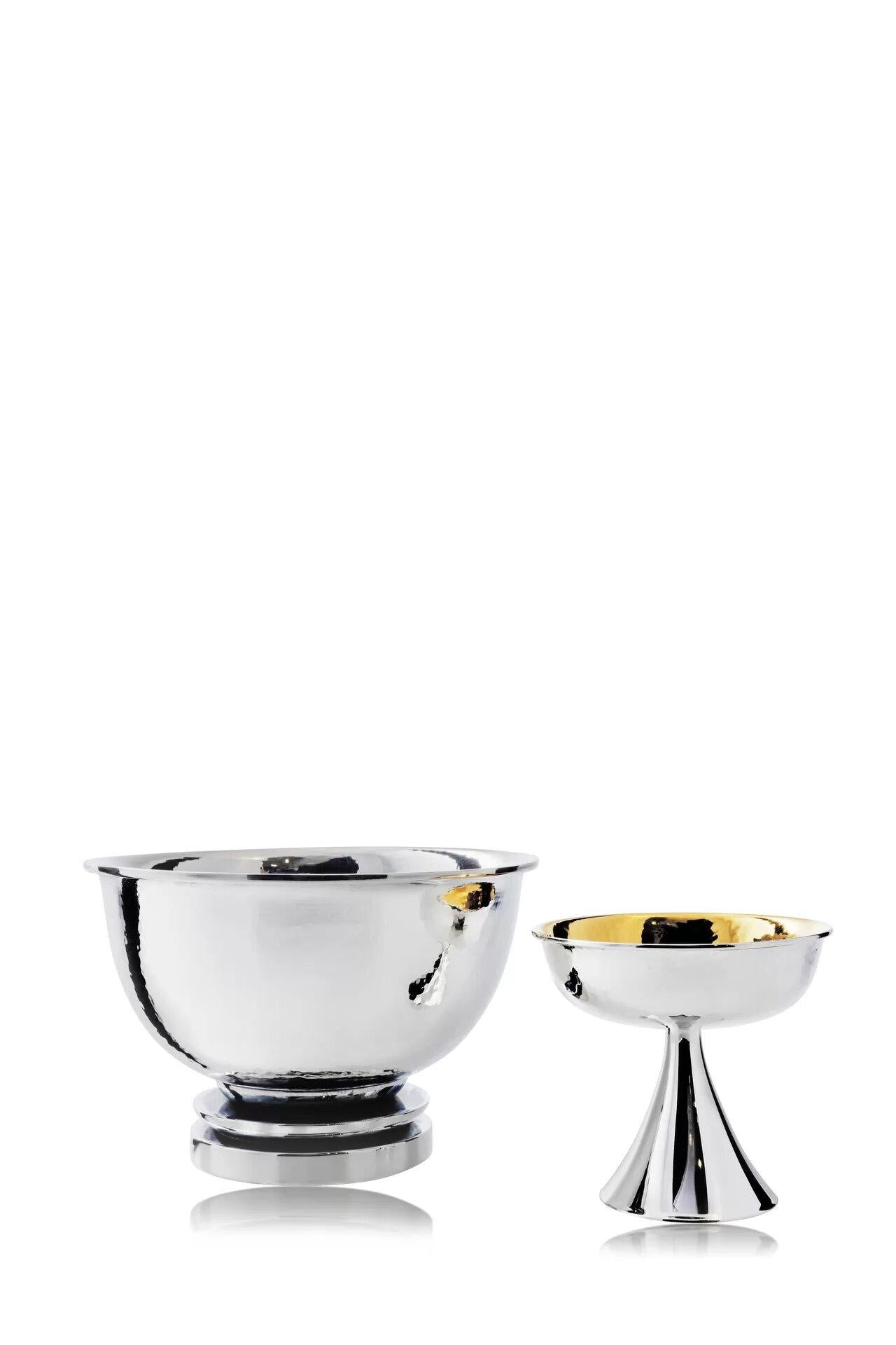A handcrafted Danish sterling silver caviar bowl, meticulously crafted to exemplify the highest standards of quality and infused with the elegance of the Art Deco era. This exquisite piece comprises three distinct components: a primary bowl, a