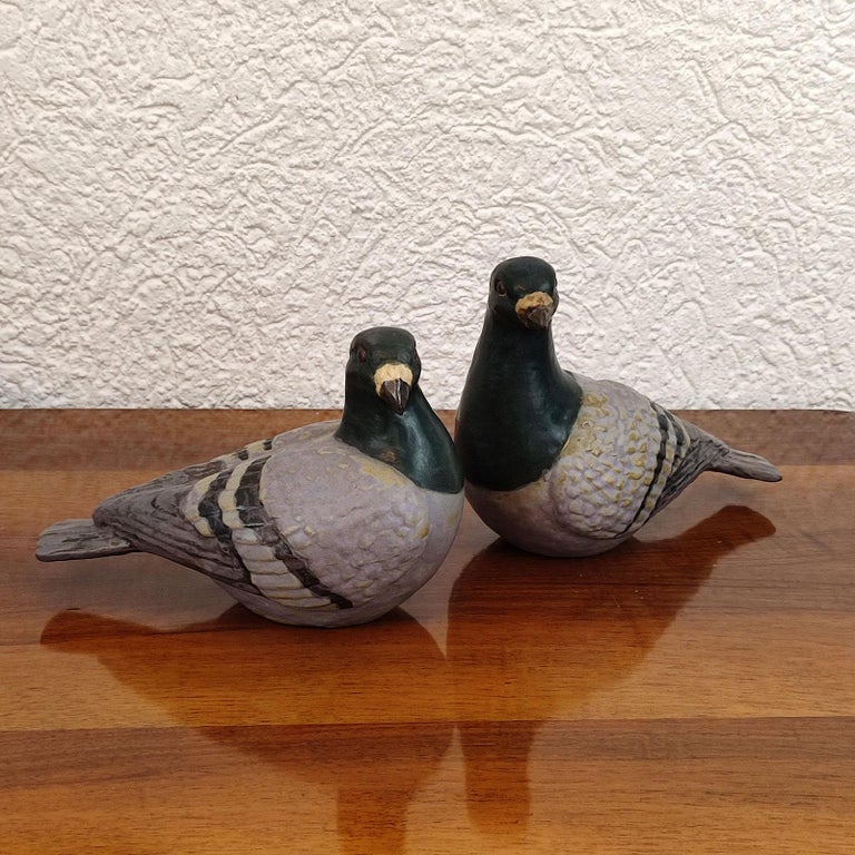 A beautiful pair of doves, designed and manufactured by Elise Glaffey, made in Denmark. Glazed ceramic, life size sculpture. Each marked Glaffey and Made in Denmark. Elise Glaffey is best known for making one-of-a-kind animal sculptures. Very good