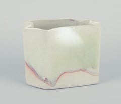Danish studio ceramicist. Ceramic vase with glaze in light tones.