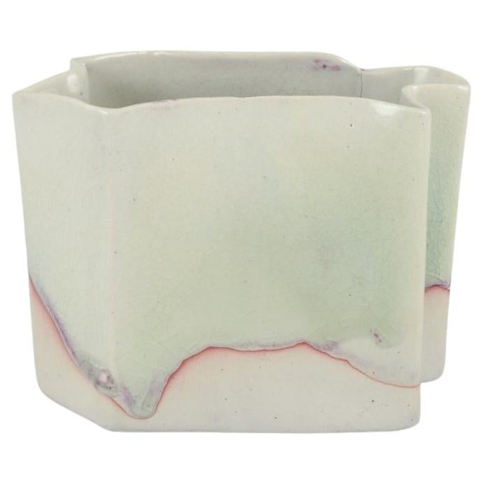 Danish studio ceramicist. Ceramic vase with glaze in light tones.