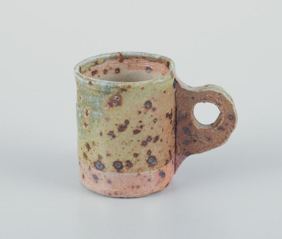 Scandinavian Modern Danish studio ceramicist. Three unique miniature ceramic mugs. 1970/80s For Sale