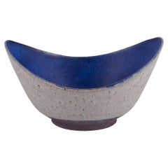 Danish studio ceramist. Large oval ceramic bowl. Dated 1945