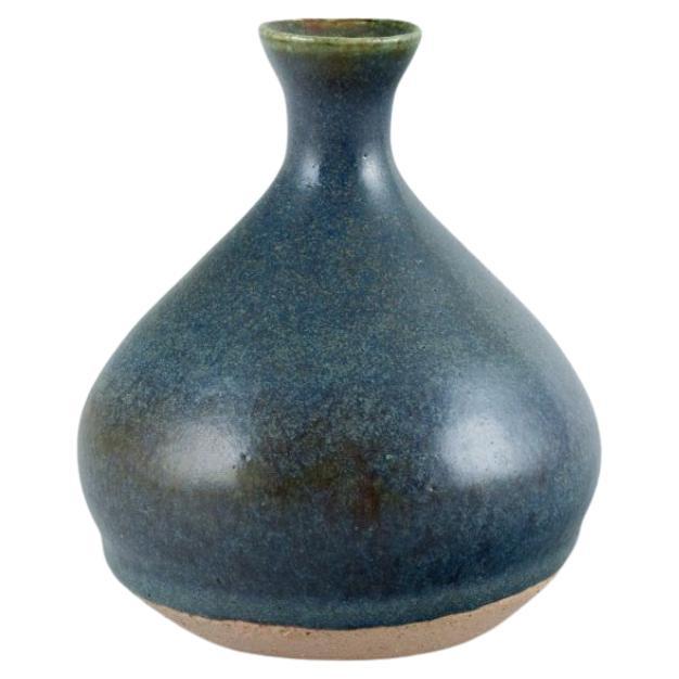 Danish studio ceramist. Unique ceramic vase with blue-toned glaze. For Sale