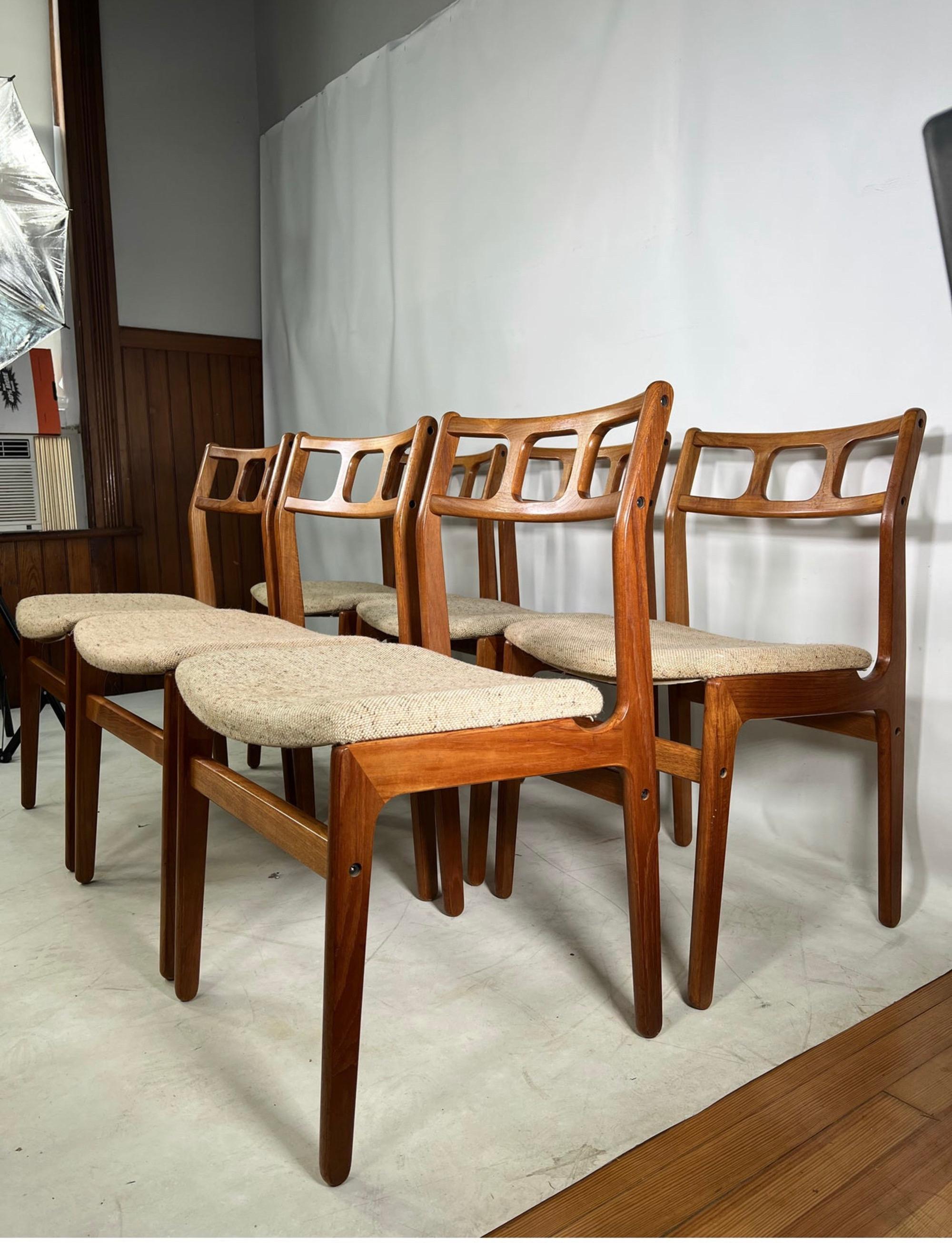 Great set of 6 vintage d scan Danish style chairs. The chairs have a great sculptural design and are solid teak.