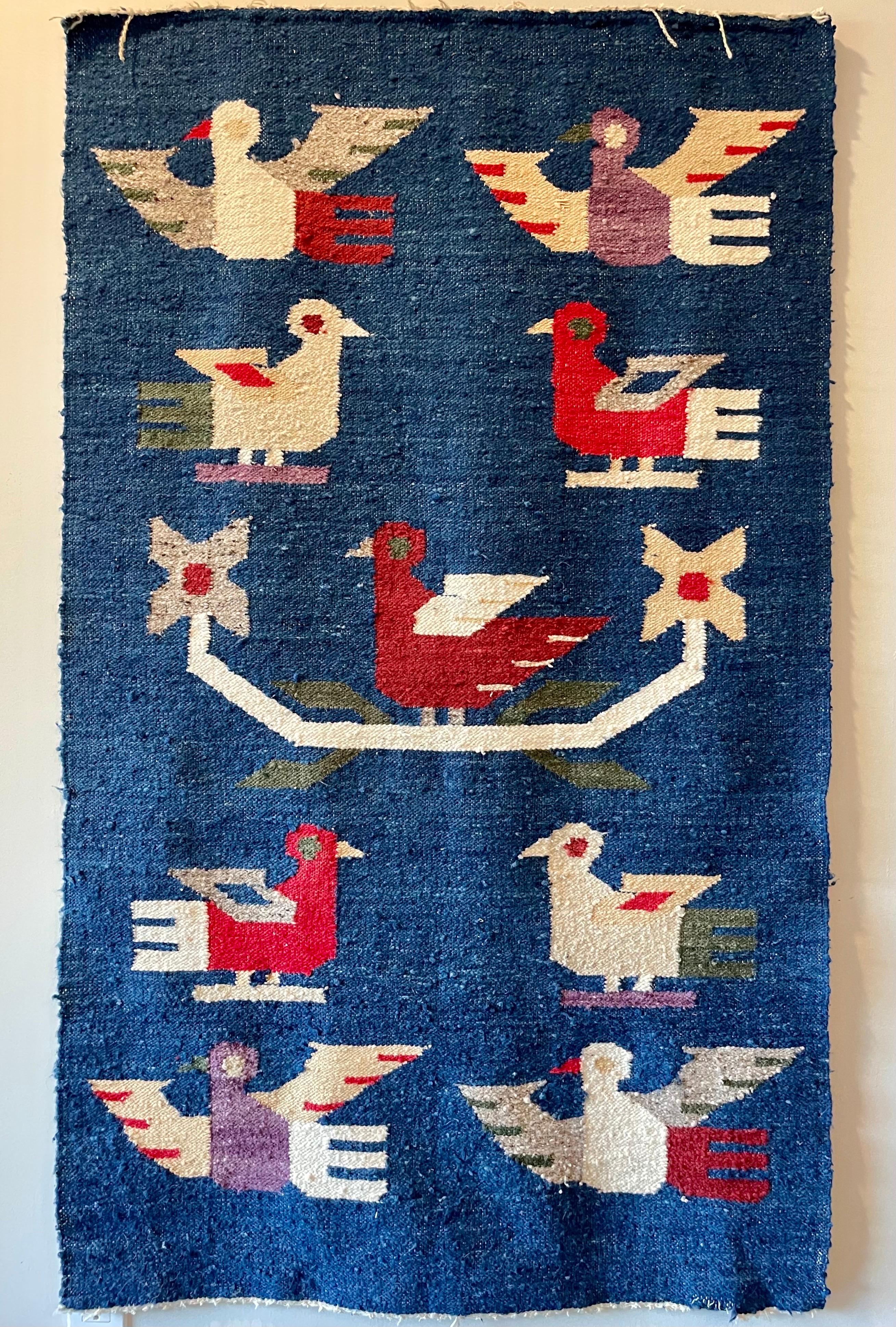 Lovely hand-woven wool tapestry thought to be either Danish or Swedish based upon the estate it came from. Excellent colors and birds and flowers. 
54