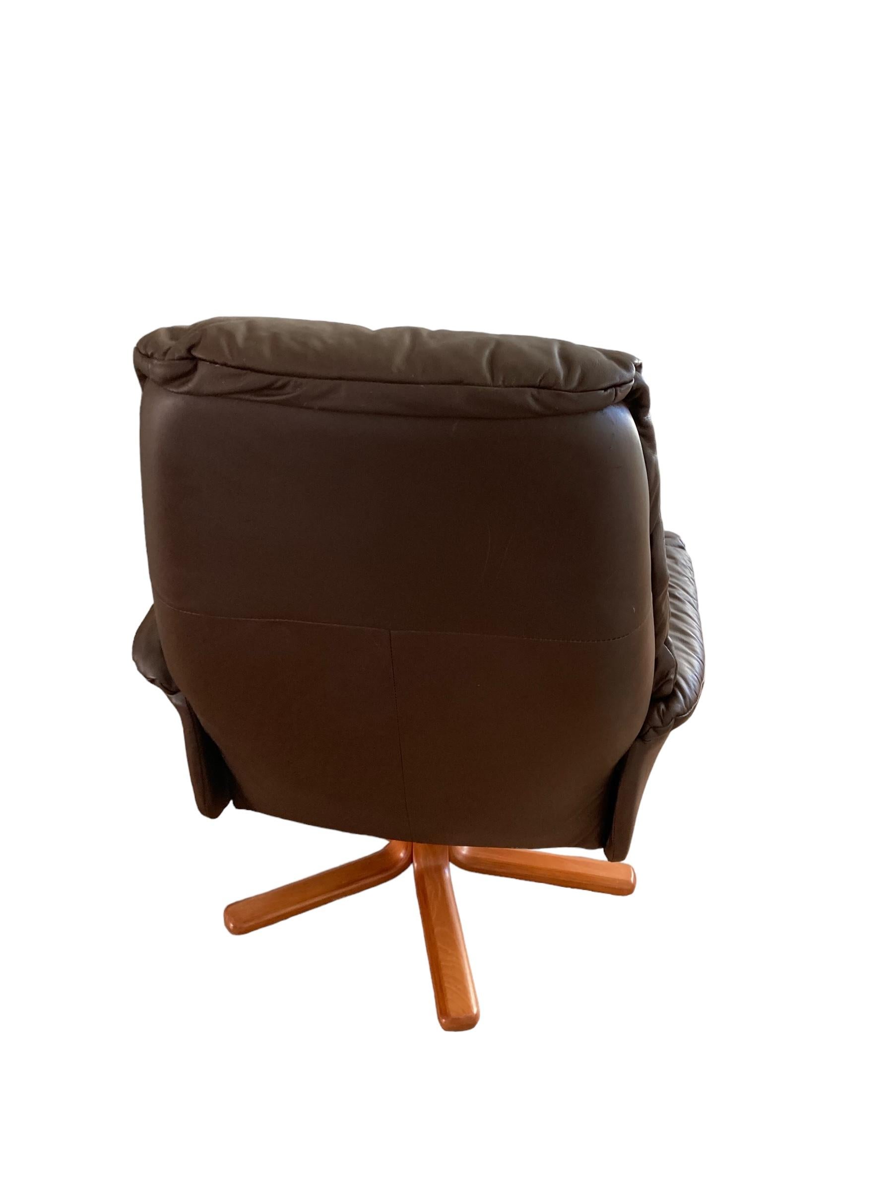 British Danish style vintage swivel chair, upholstered in in Dark Brown Faux leather, 19