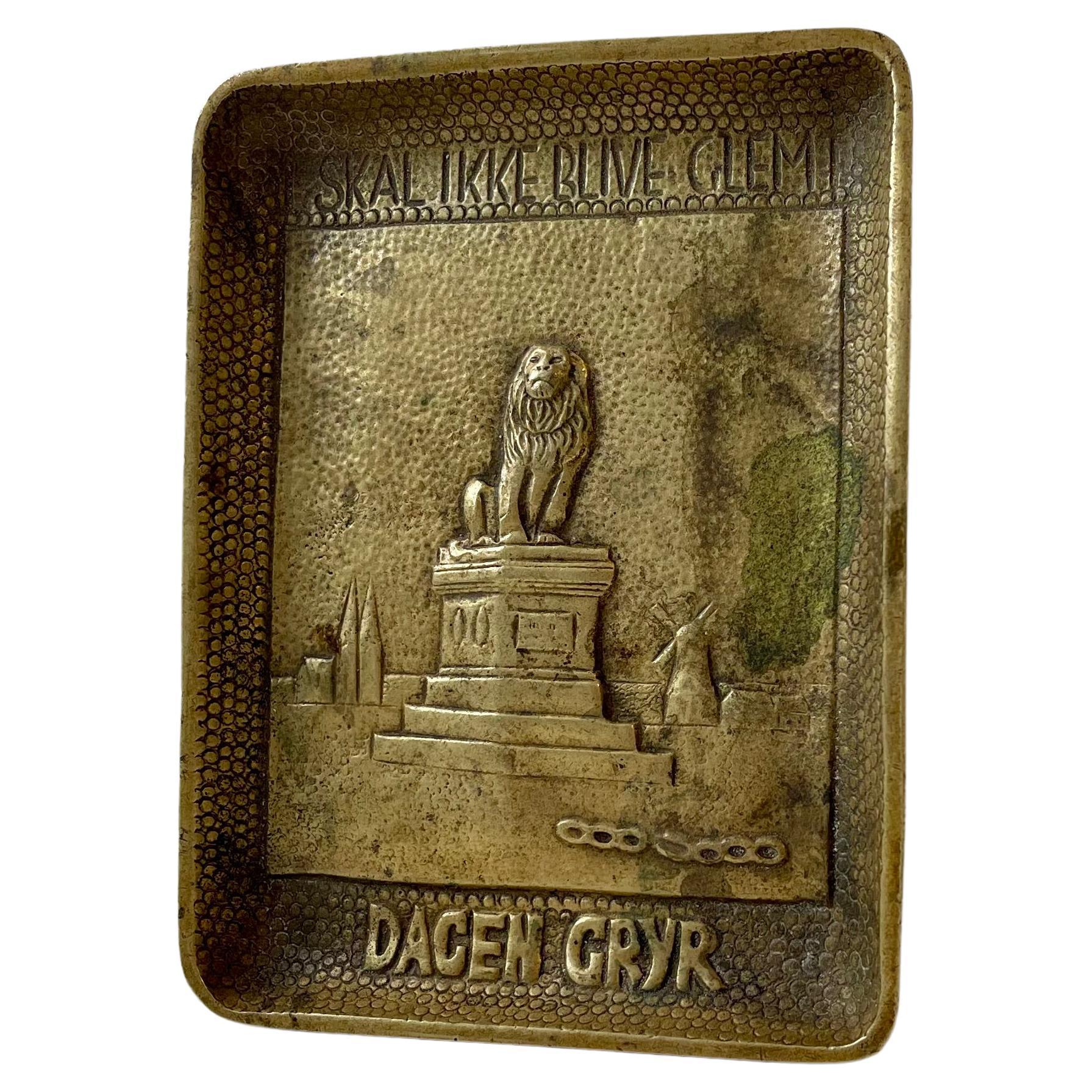 Cenicero simbólico danés de león en bronce, años 40