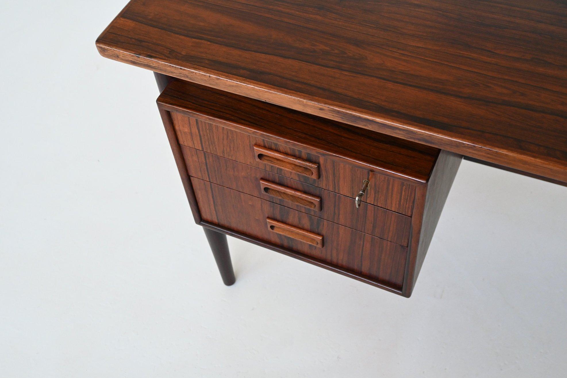 Danish symmetric freestanding desk in rosewood Denmark 1960 1