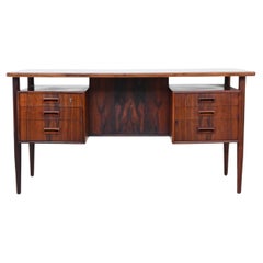Danish symmetric freestanding desk in rosewood Denmark 1960