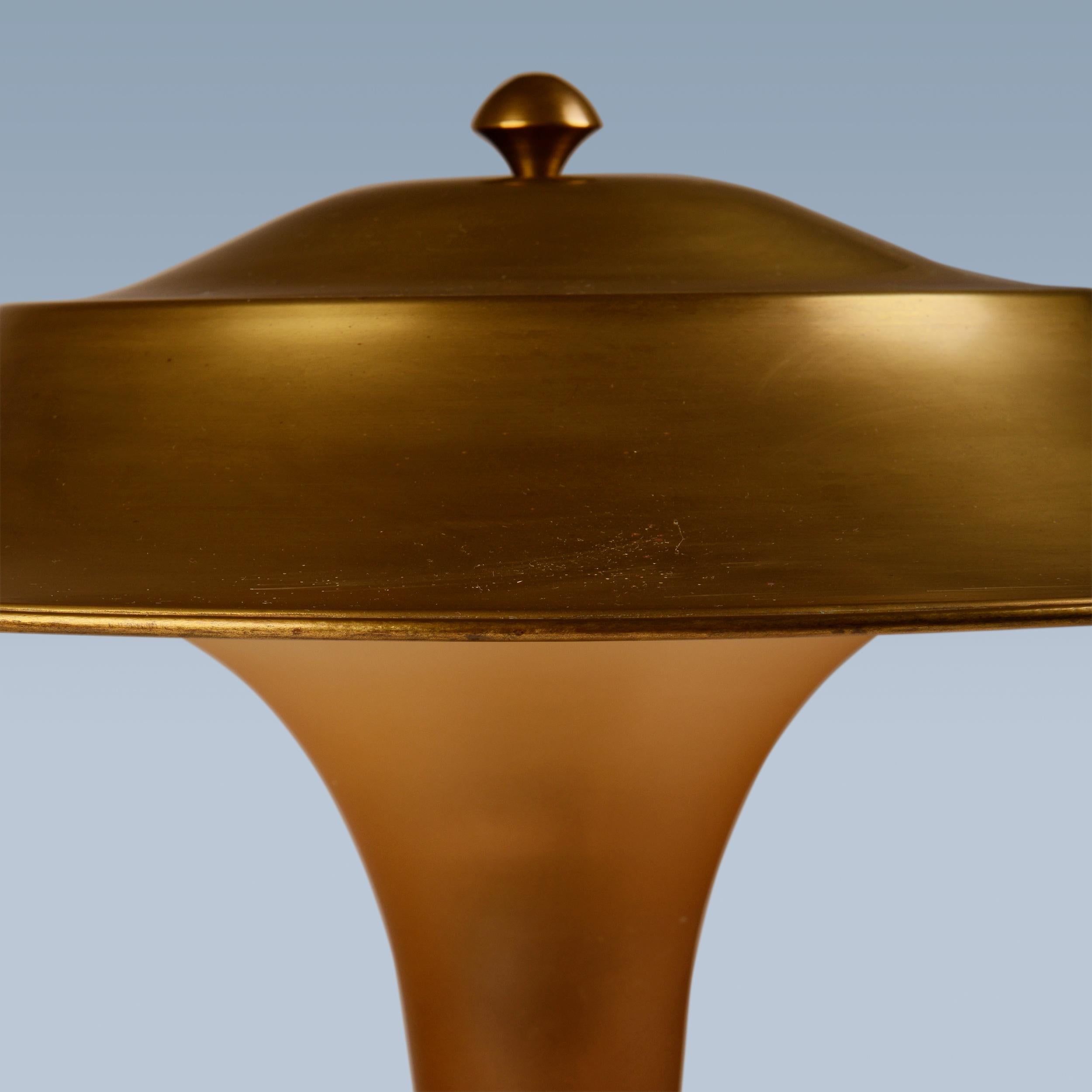 20th Century Danish table lamp with brass foot, topshade and matt amber coloured glass stem  For Sale