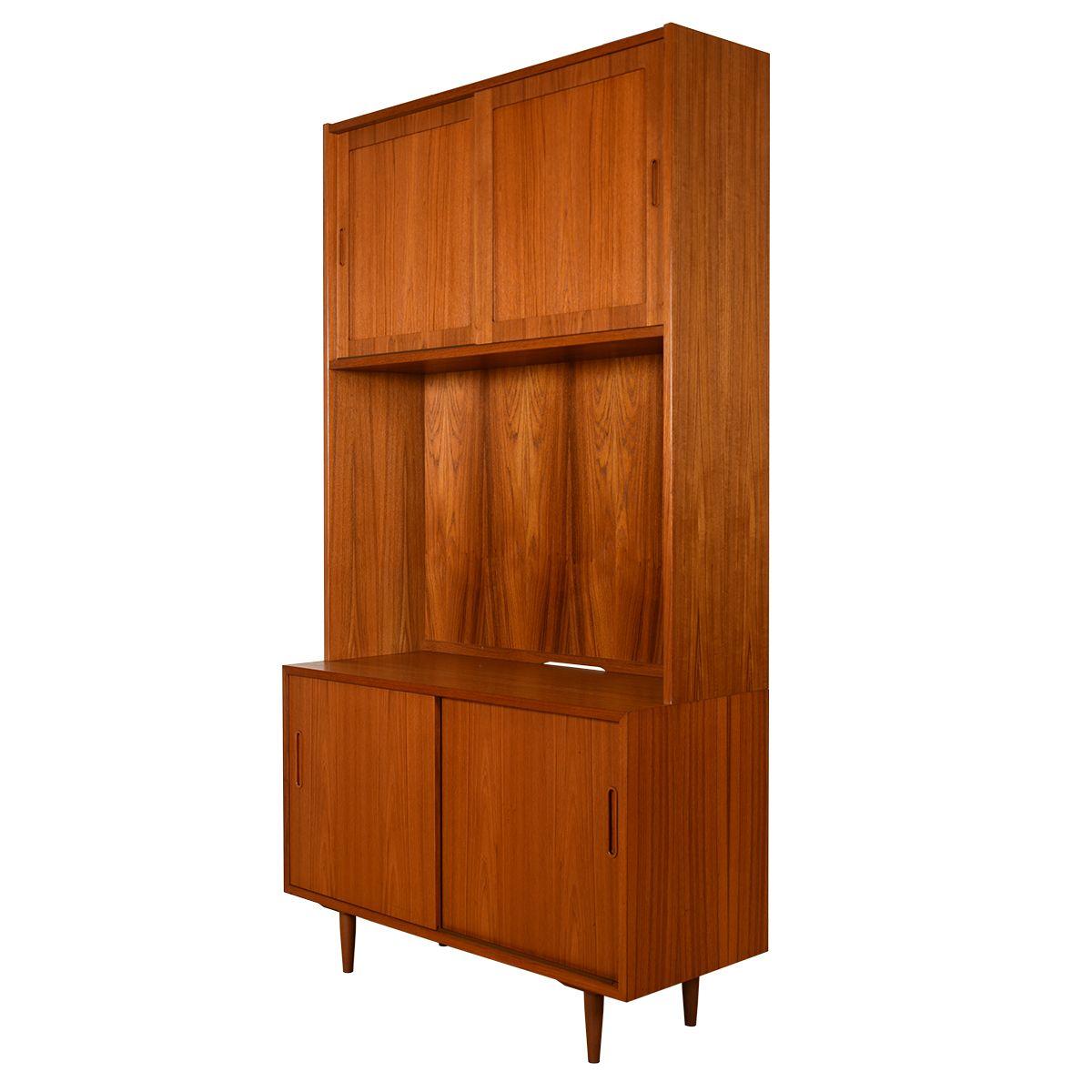 Lovely to look at, and further enhanced with many functional features.
A storage & display cabinet w: both upper & lower sliding door storage.
The lower cabinet has two sliding doors, a felt-lined shallow drawer, and adjustable shelves.

A wonderful