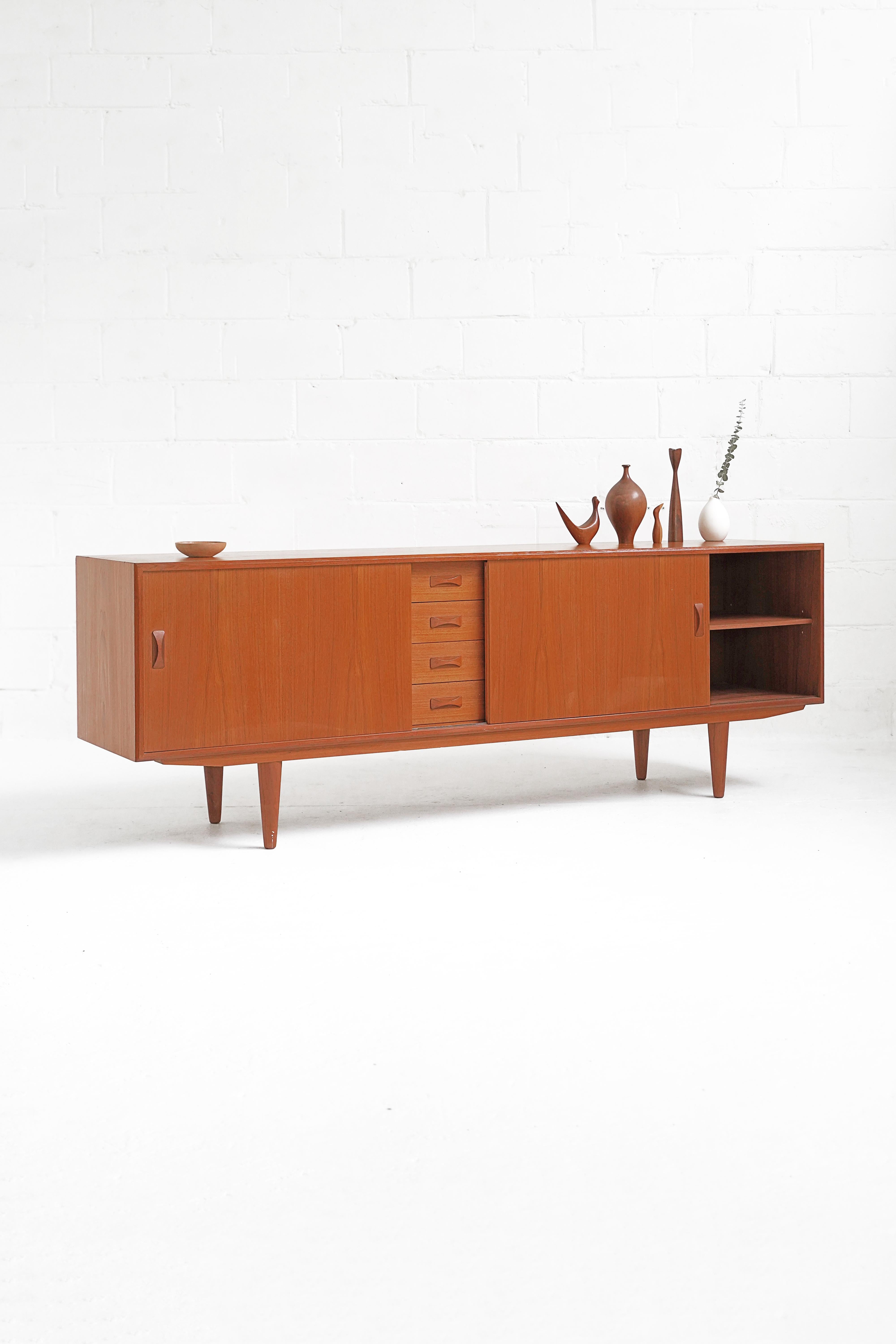 Stunning sideboard for Clausen & Søn. Overall in great vintage condition with minor wear. Scratching on top and veneer chipping in corner shown in photos.